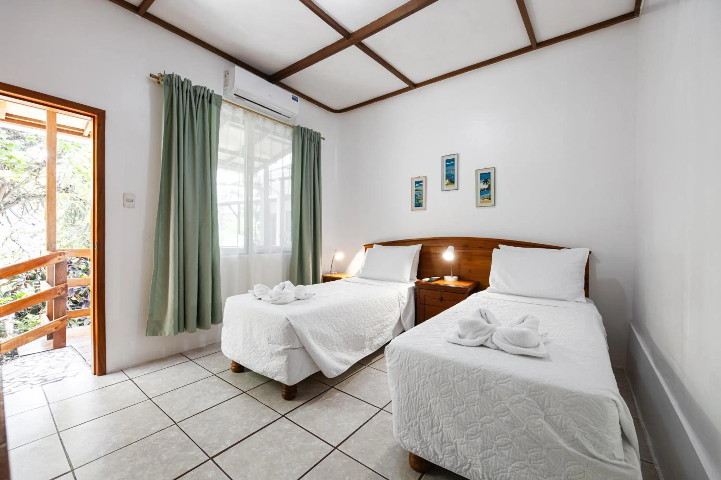 Bed in La Peregrina Galapagos B&B