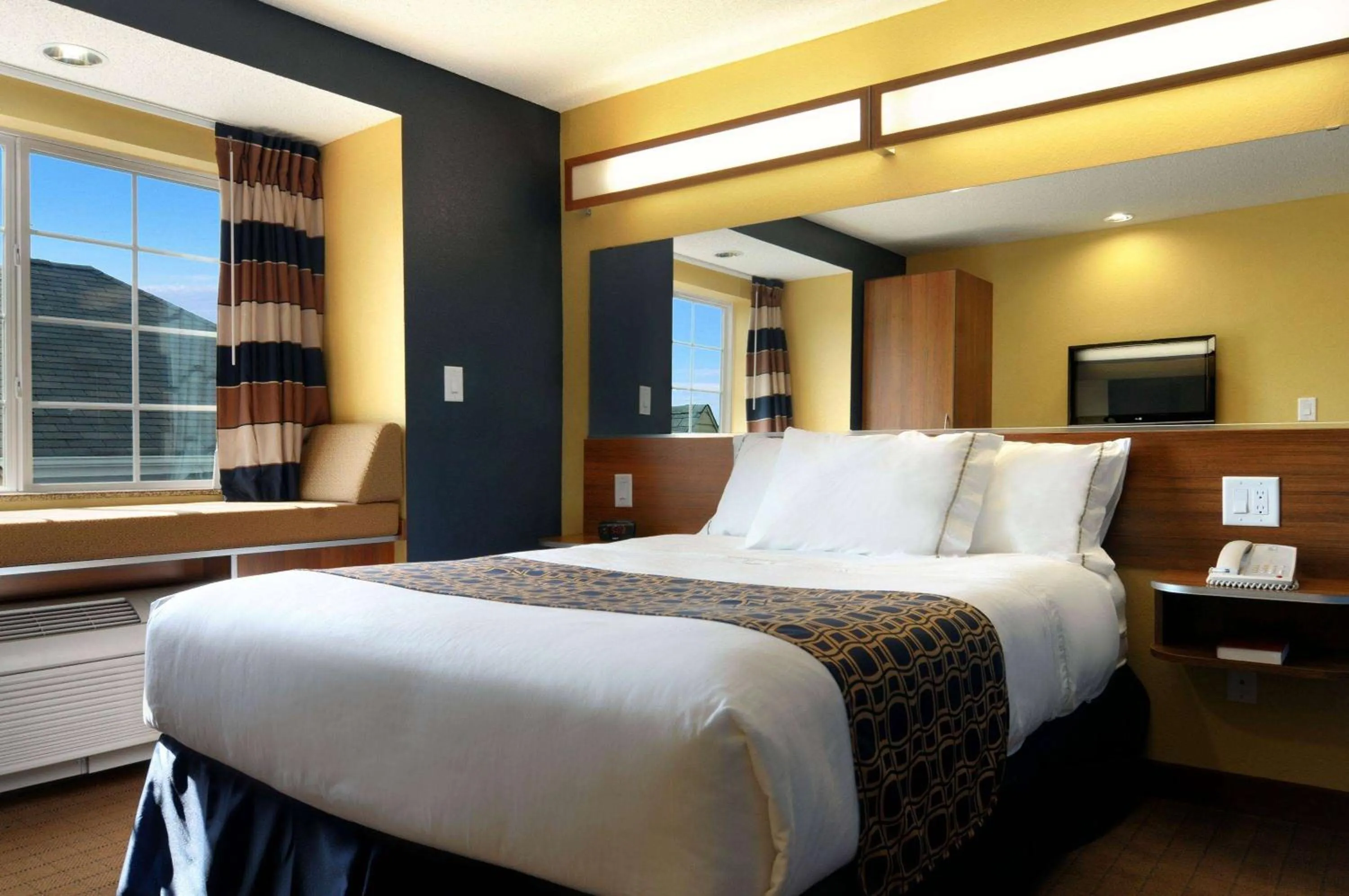 Photo of the whole room, Bed in Microtel Inn & Suites by Wyndham Columbus Near Fort Moore