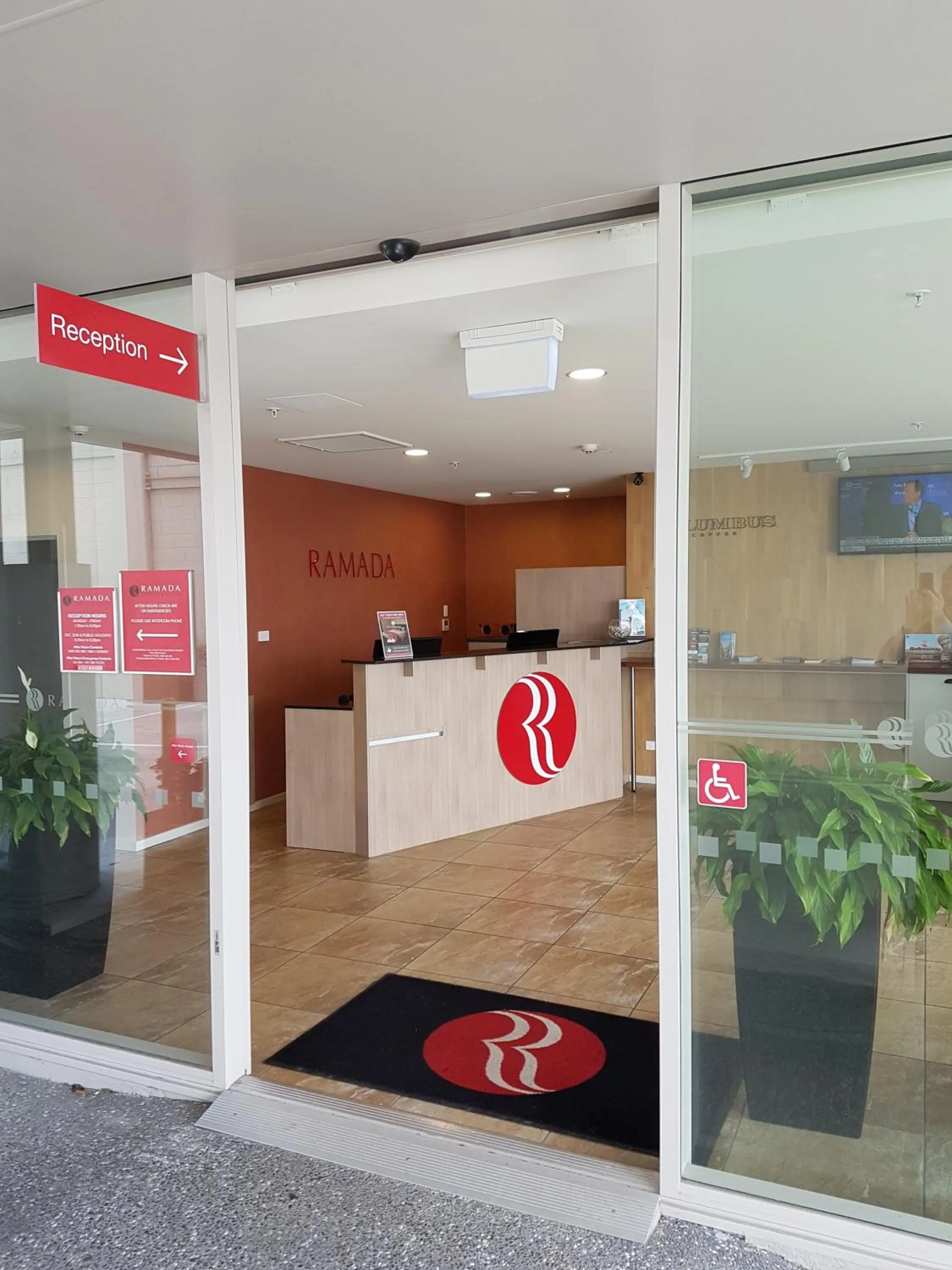 Property logo or sign in Ramada Suites by Wyndham Christchurch City