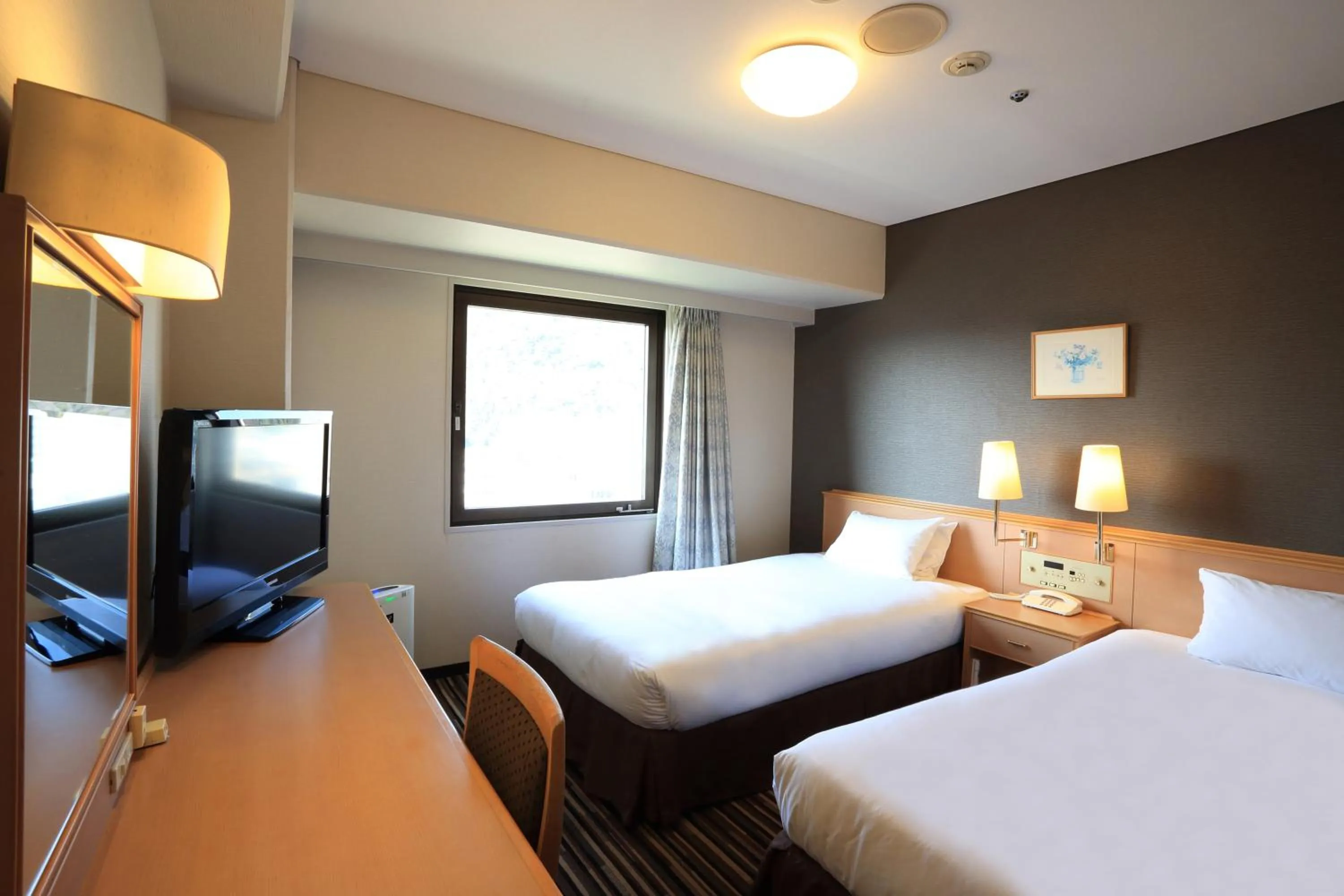 Photo of the whole room, Bed in Tokushima Tokyu Rei Hotel