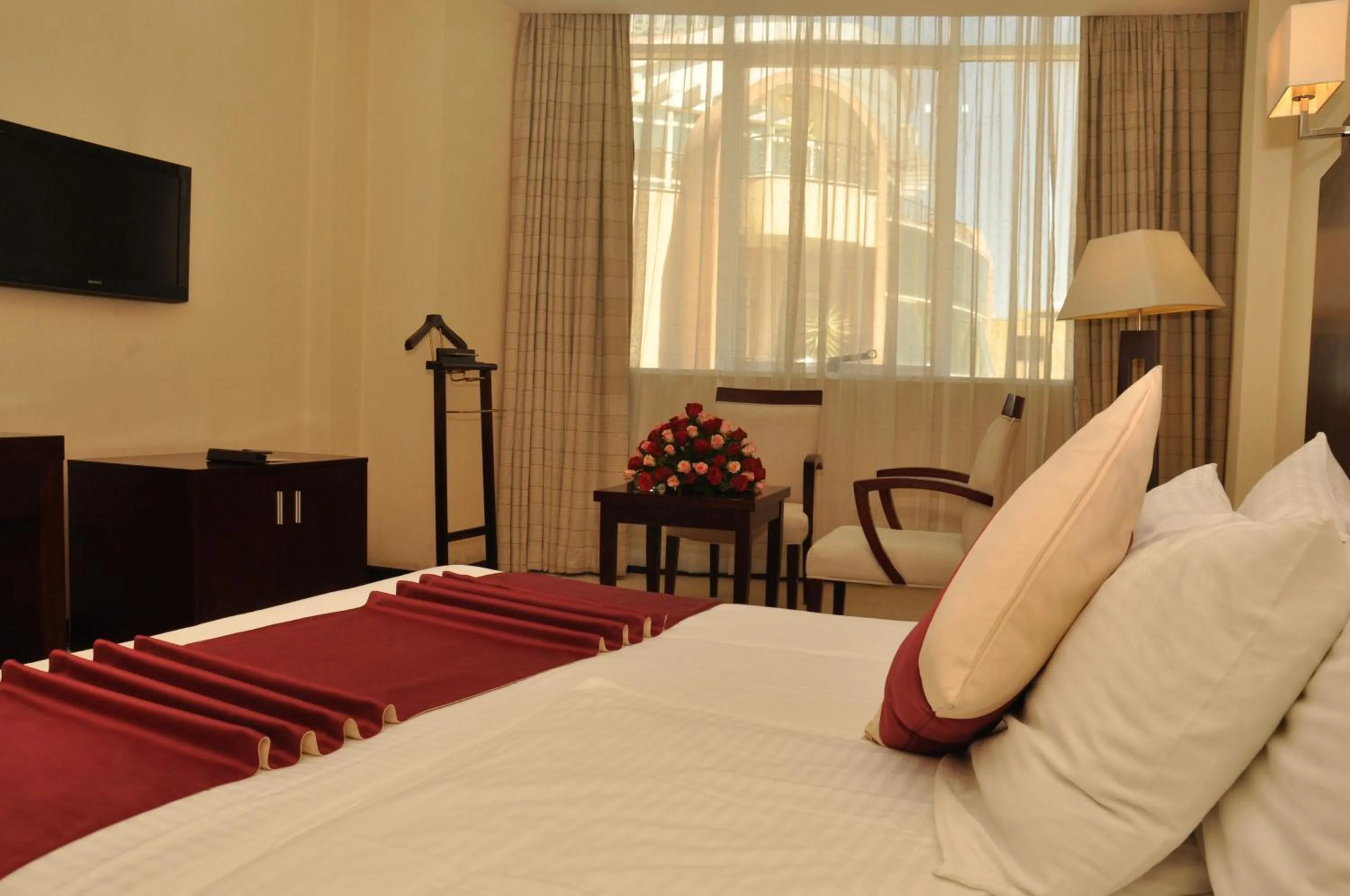 Bedroom, Bed in Harmony Hotel