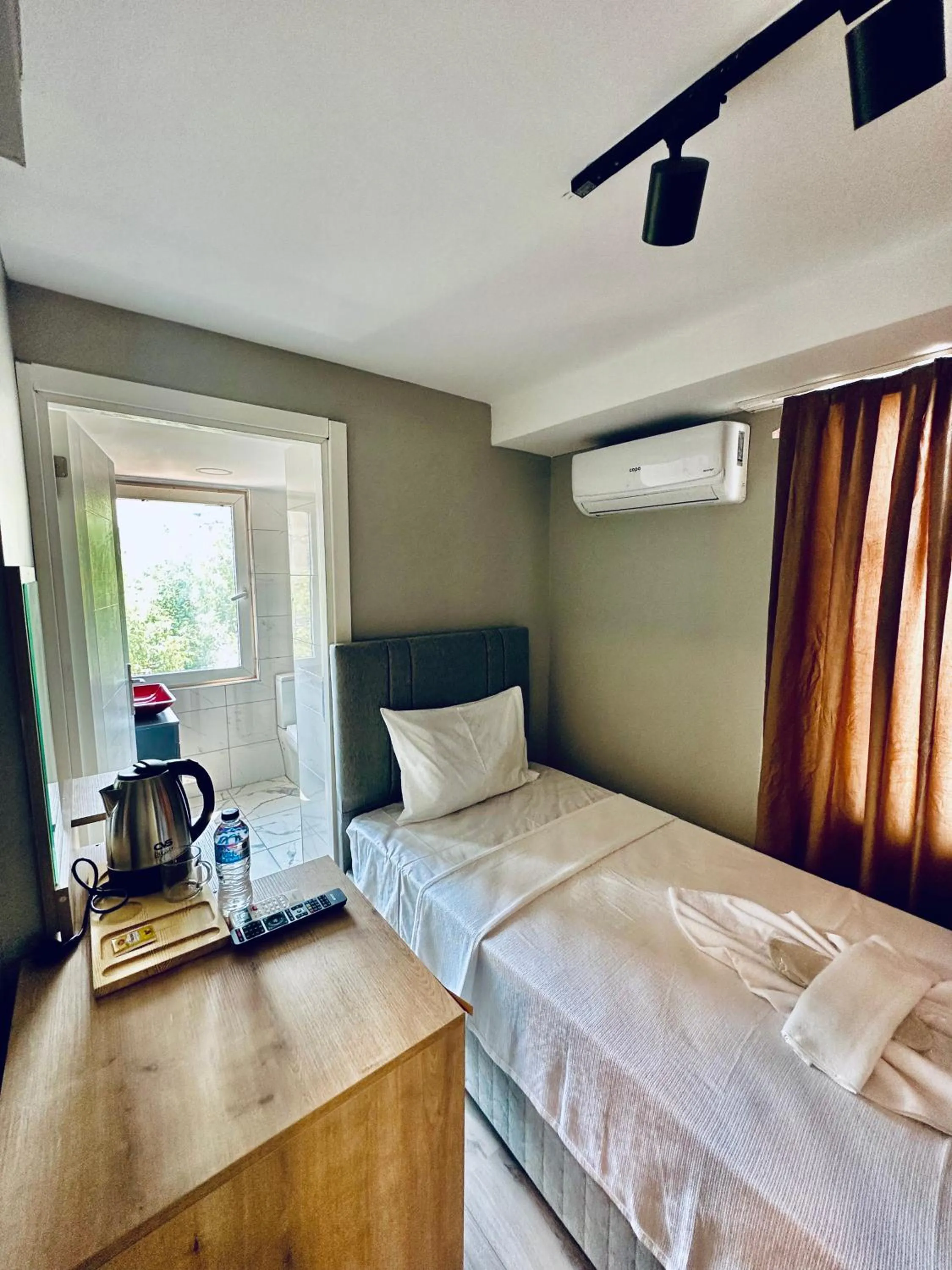 Bed in The Hera Gold Hotel