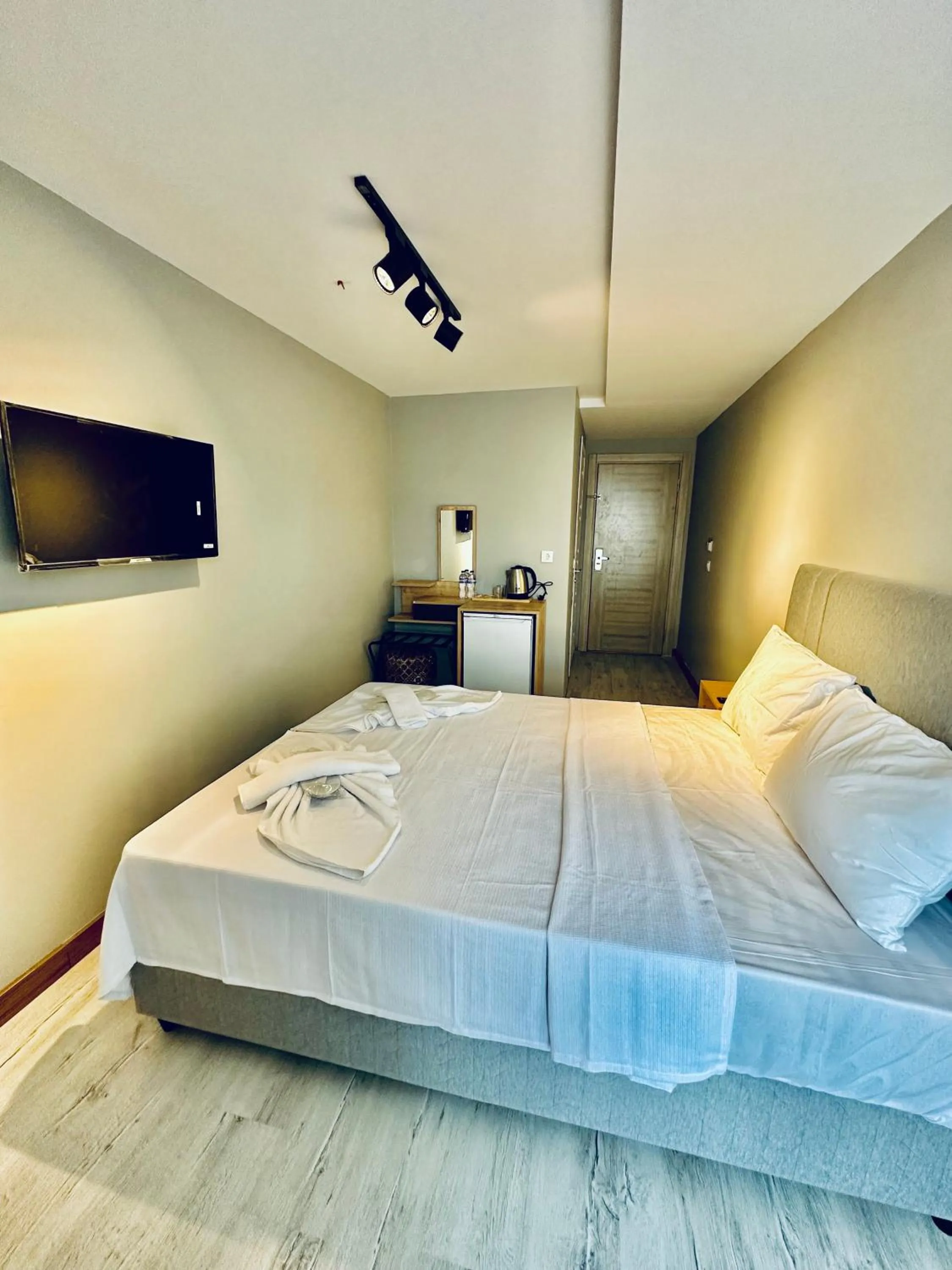 Bed in The Hera Gold Hotel