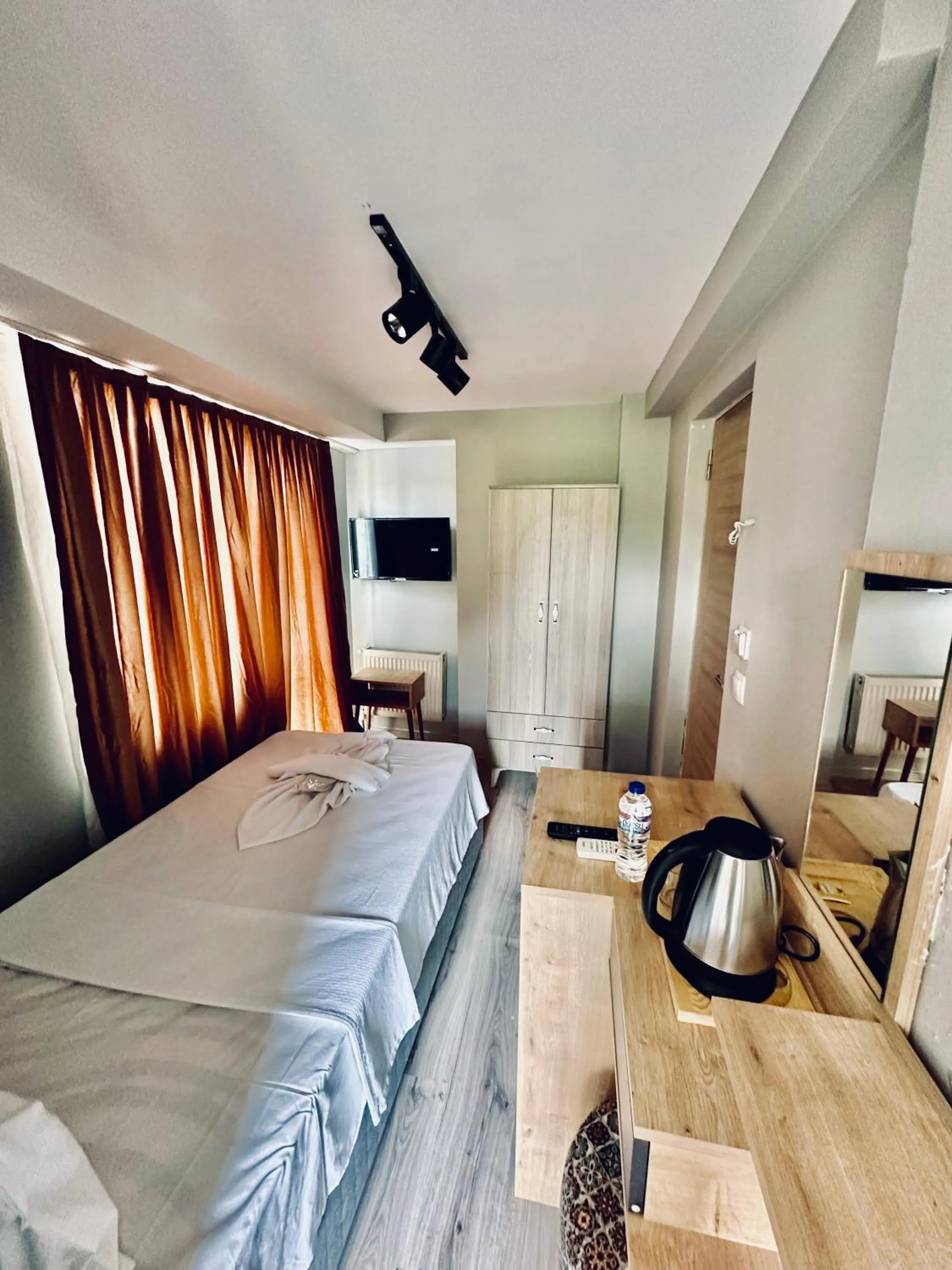 Bed in The Hera Gold Hotel