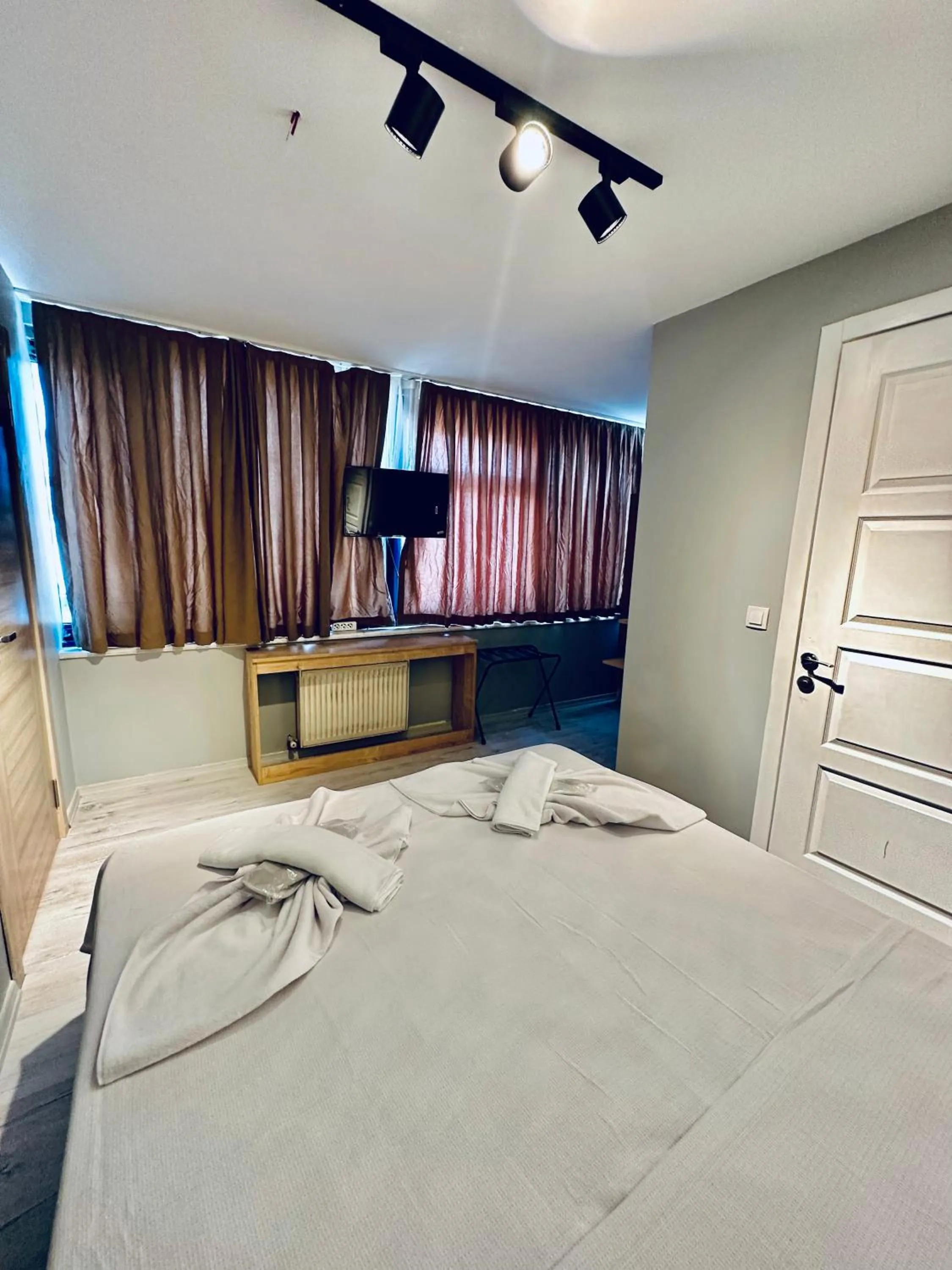 Bed in The Hera Gold Hotel