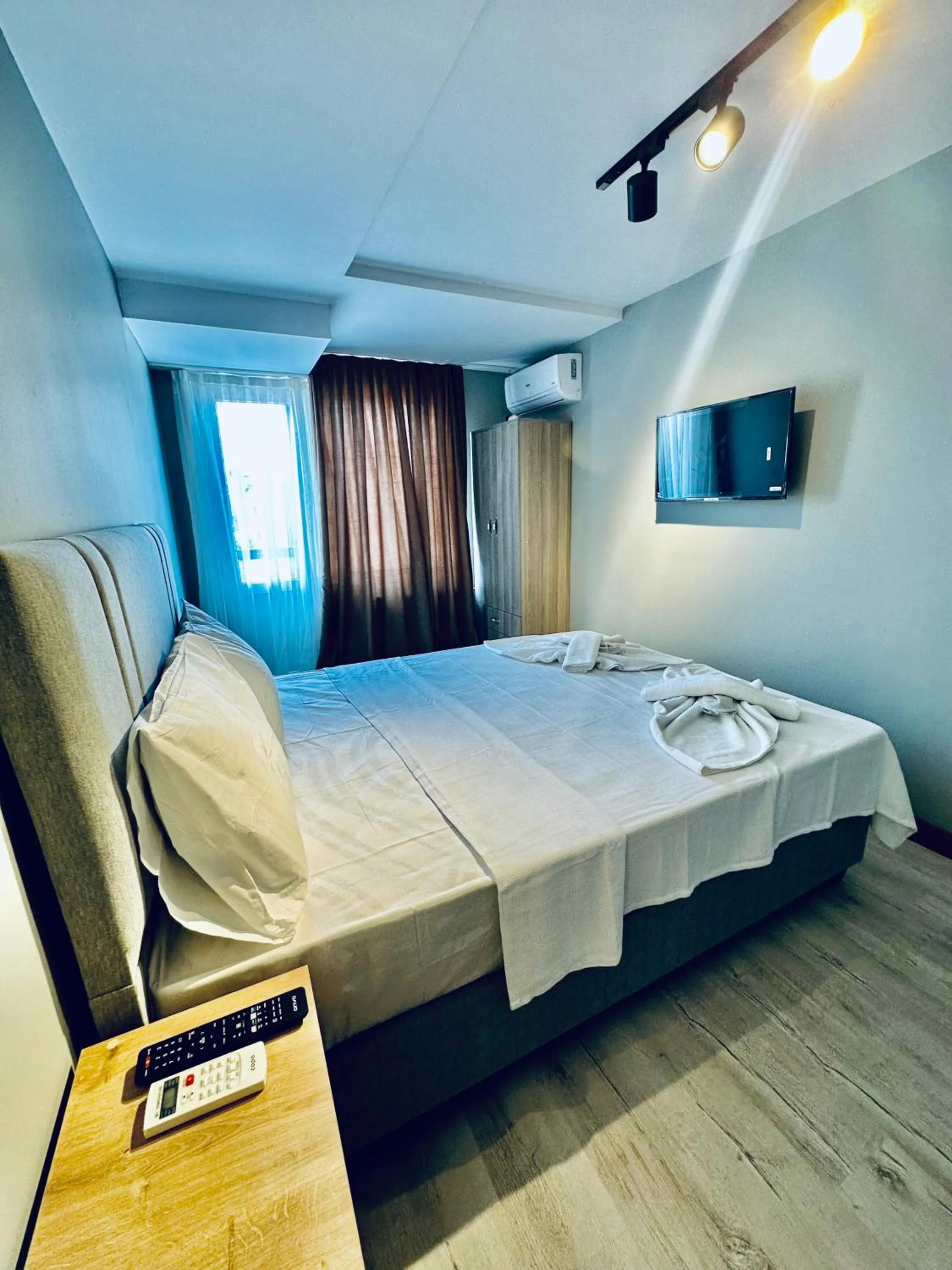 Bed in The Hera Gold Hotel