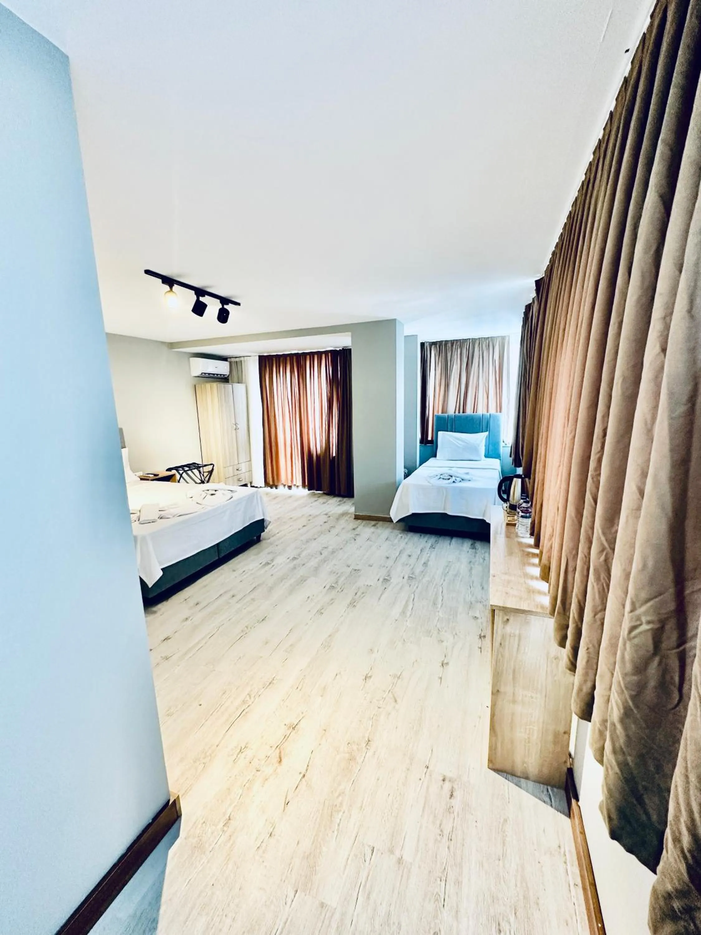 Bed in The Hera Gold Hotel