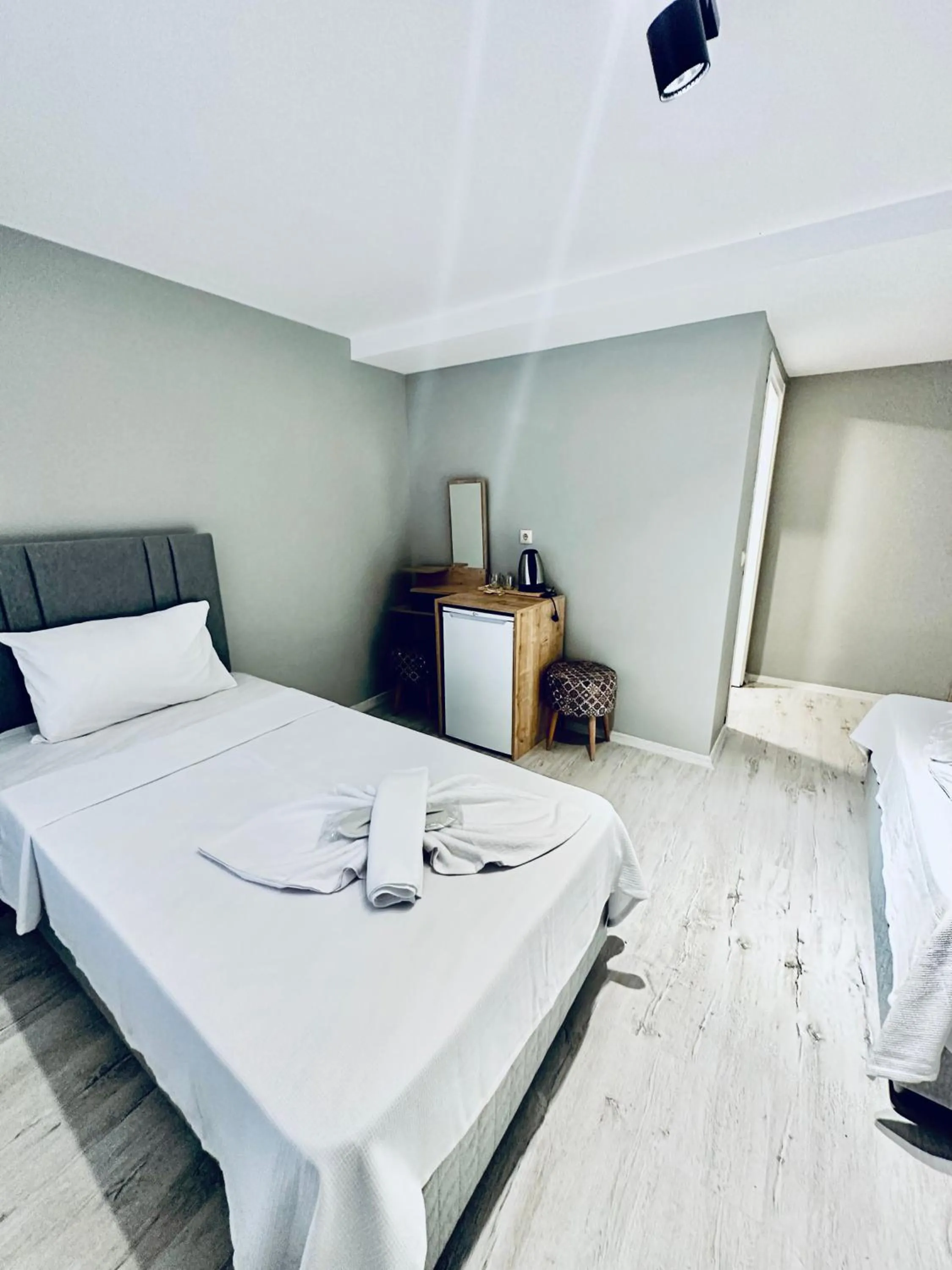 Bed in The Hera Gold Hotel