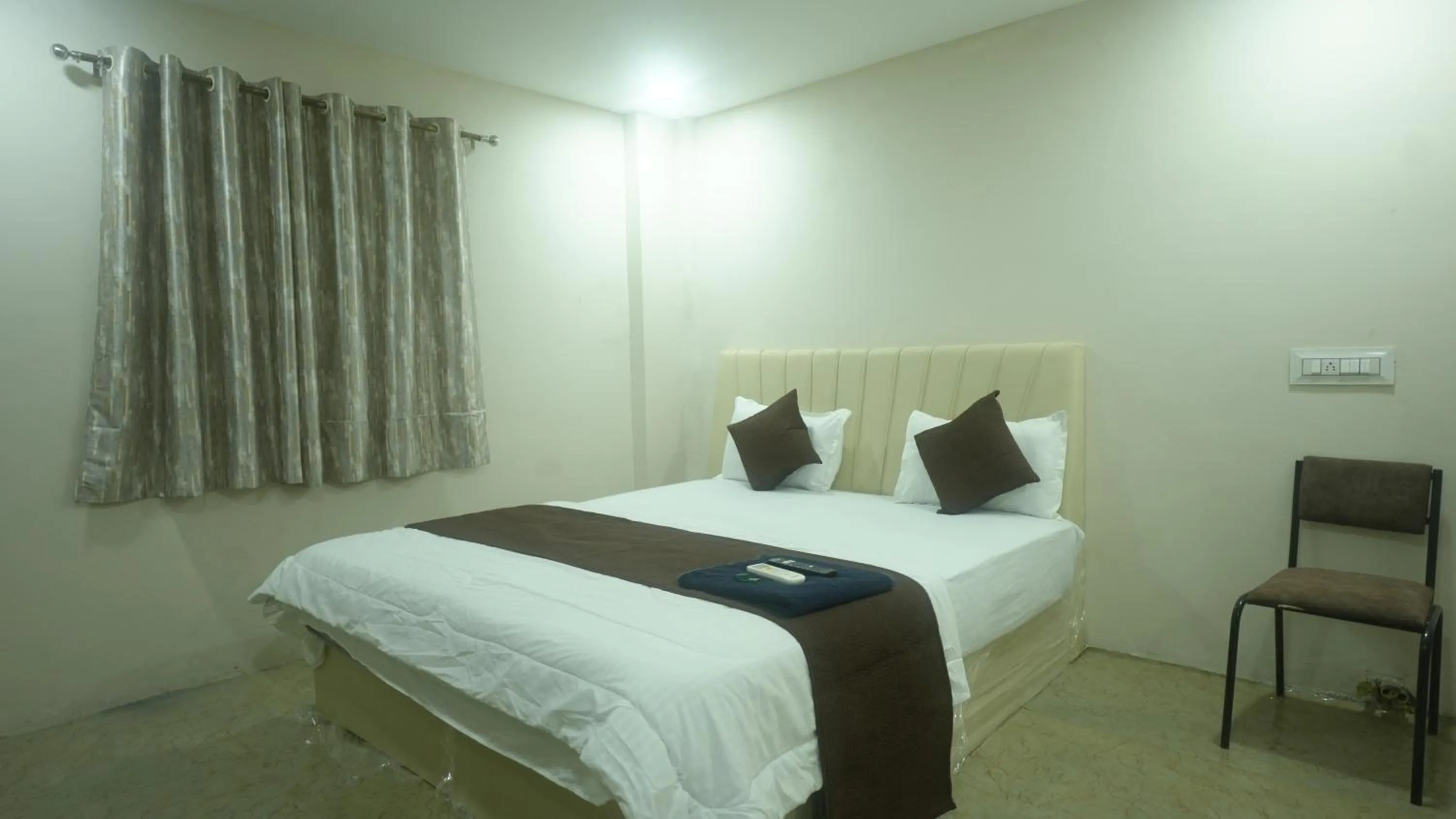 Bed in Hotel Mahakal Avantika Palace