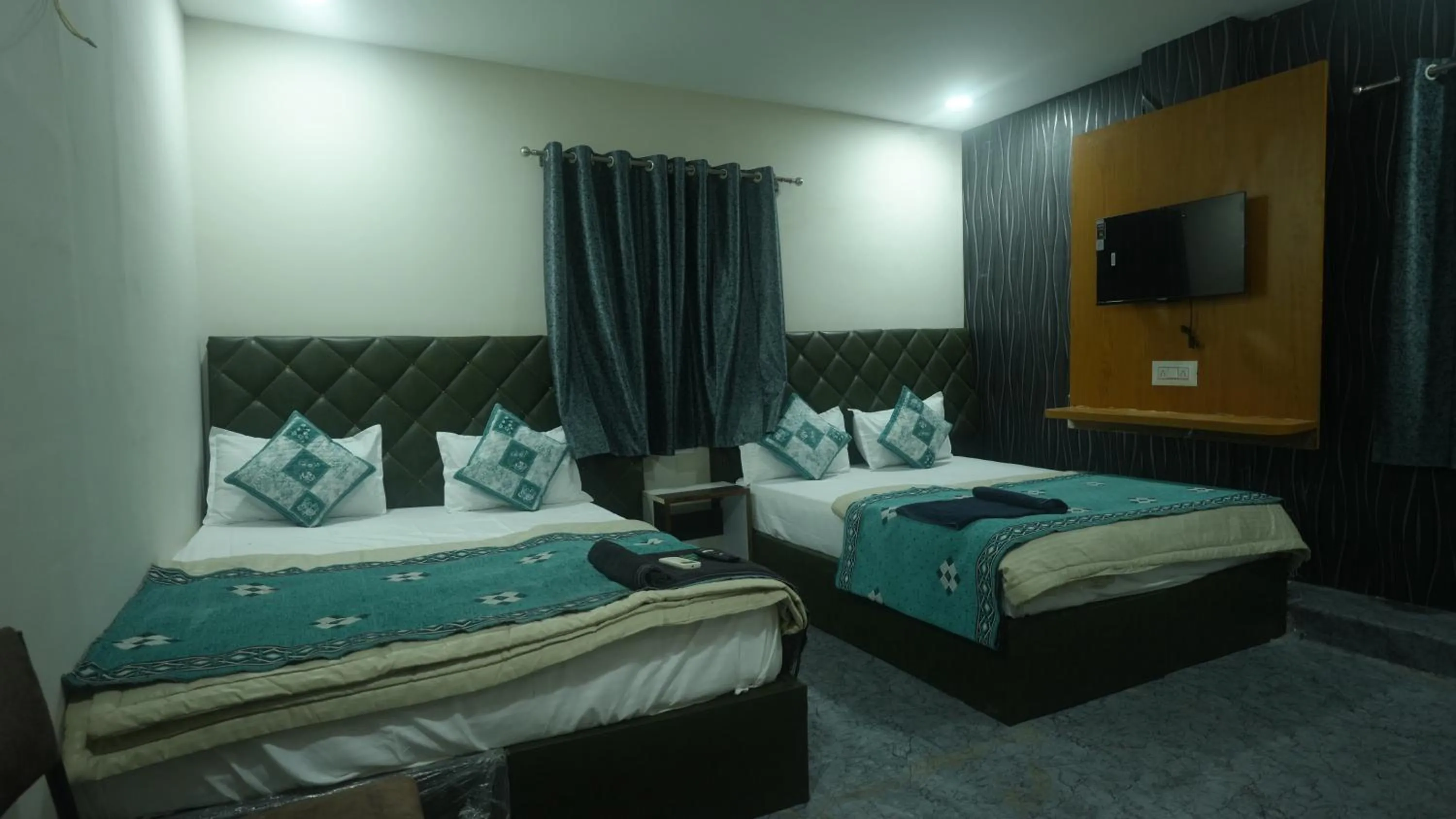 Bed in Hotel Mahakal Avantika Palace