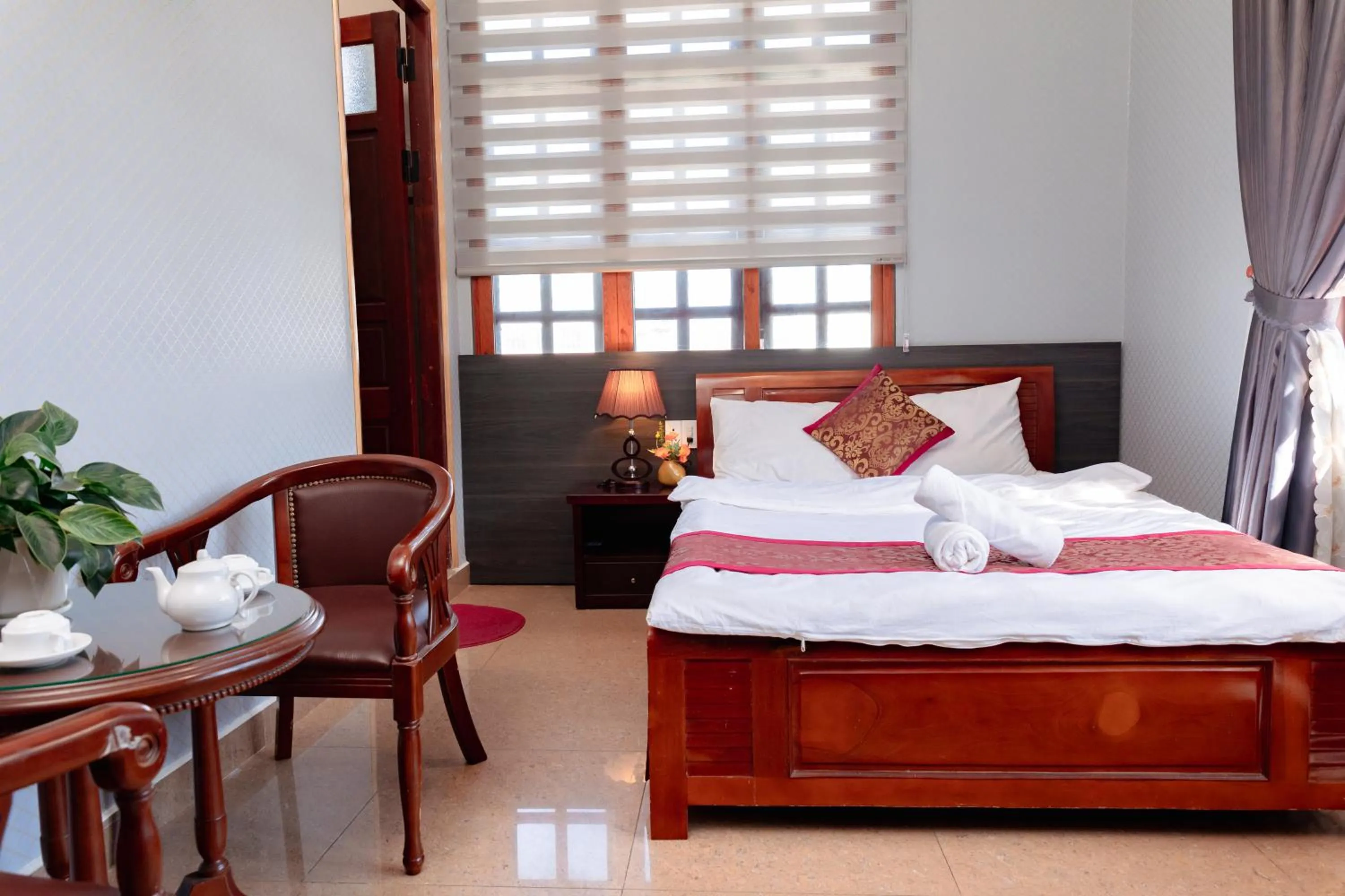 Bed in Hoang Long Hotel Da Lat City