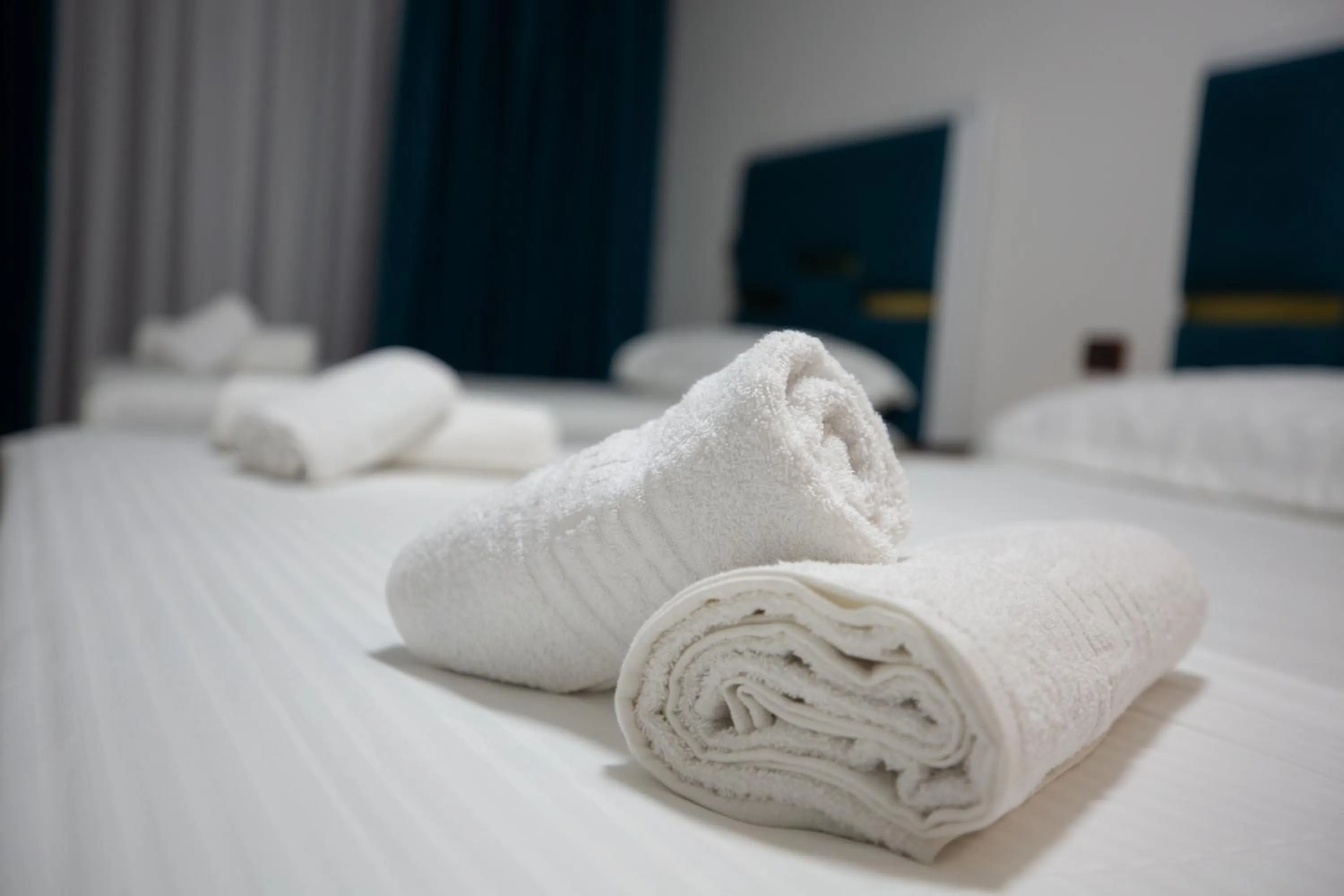 towels, Bed in Frekel Hotel