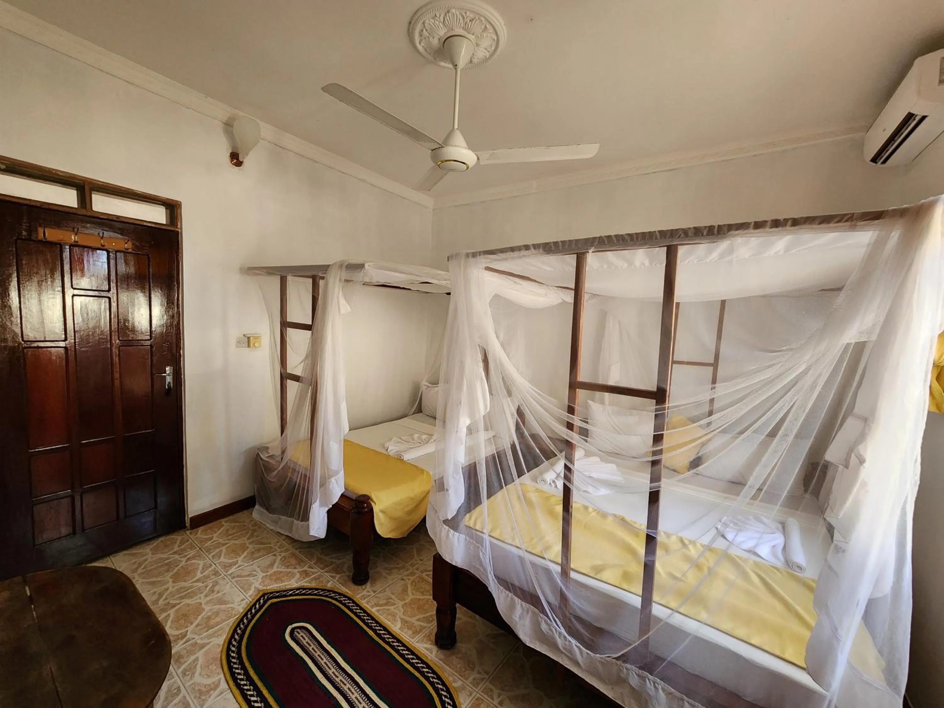 Bed in Seagull Nungwi Resort