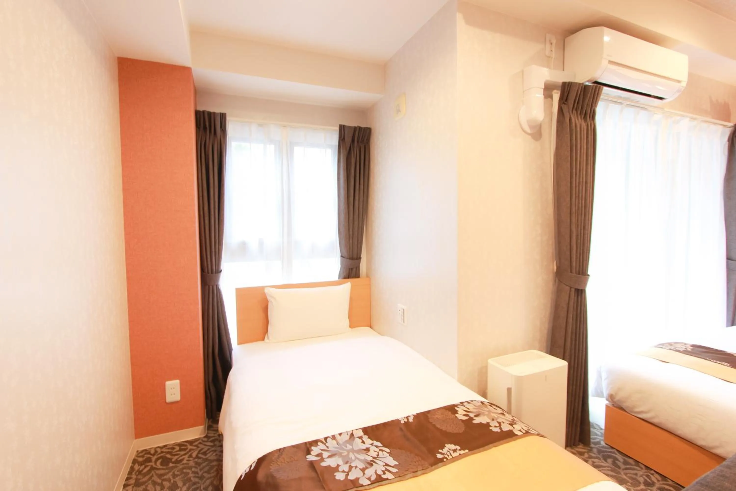 Bed in Grand Prime HAKATA HOTEL