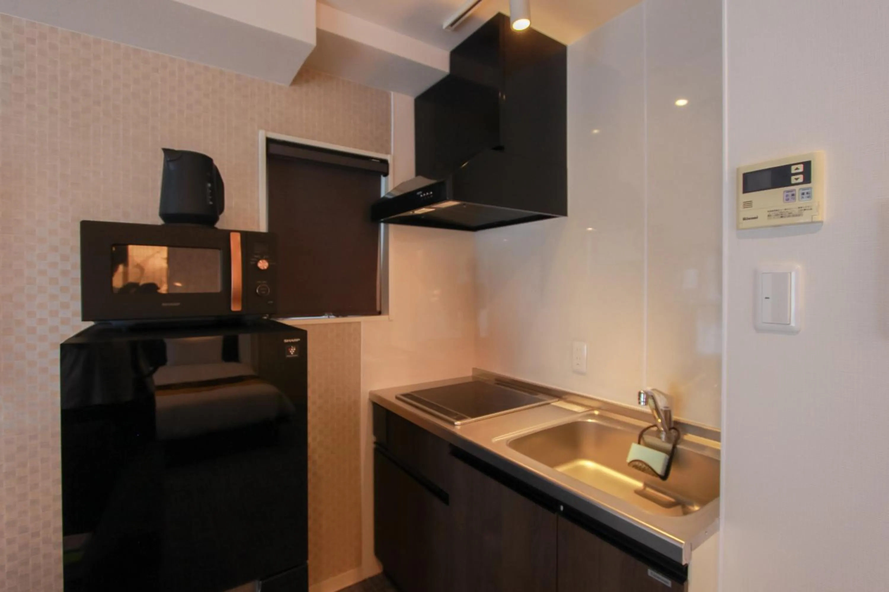 Kitchen or kitchenette in Grand Prime HAKATA HOTEL