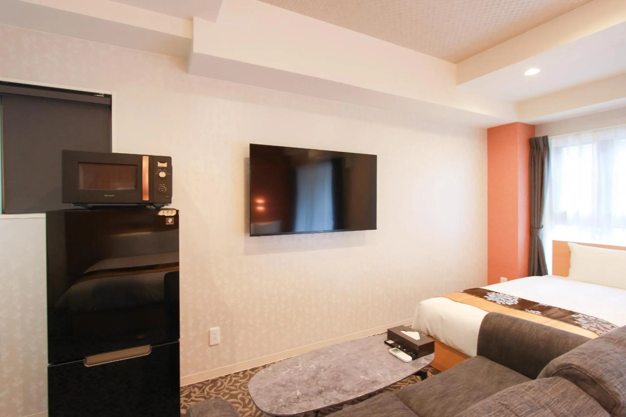 Living room, Bed in Grand Prime HAKATA HOTEL