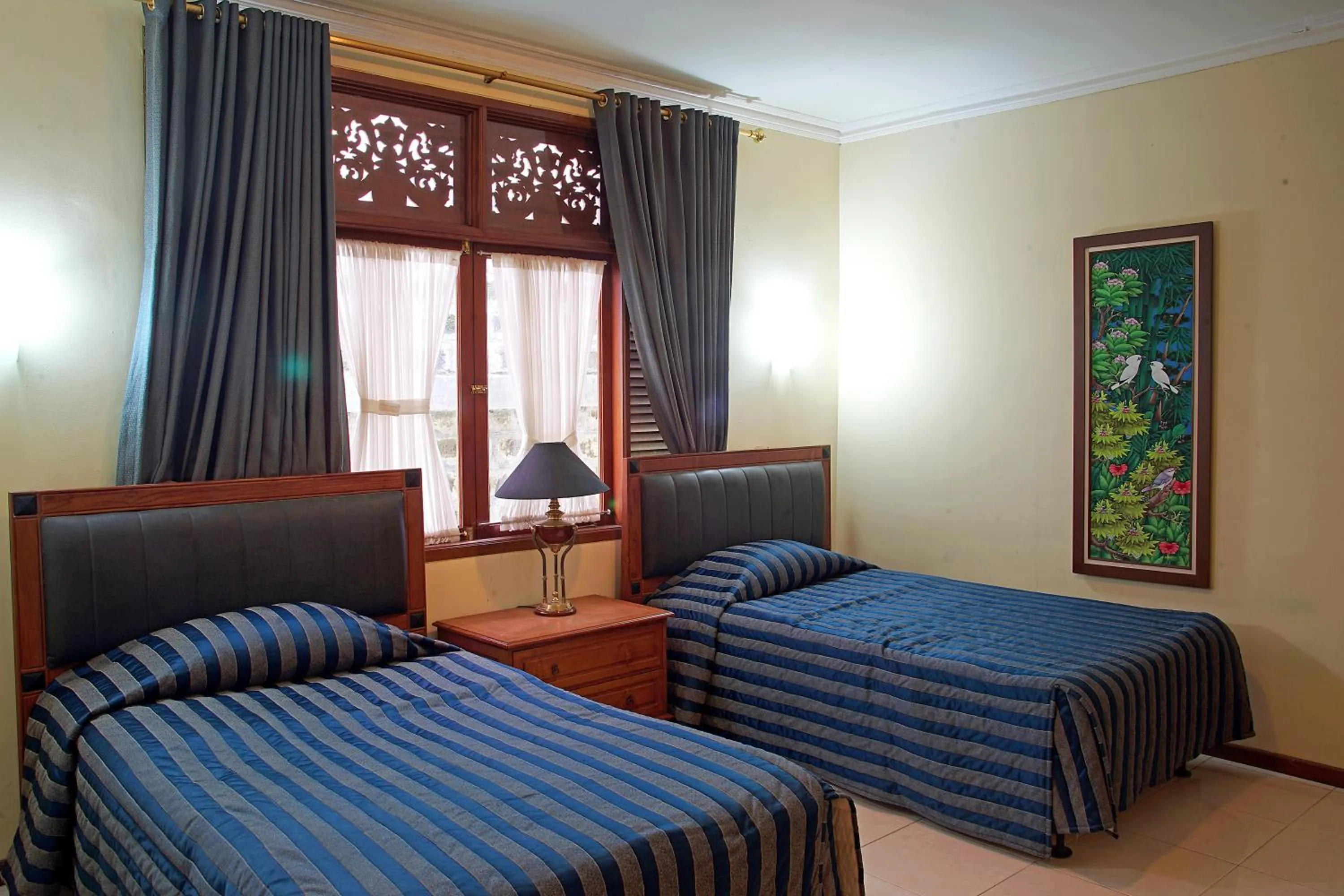 Bed in Resort Prima Sangkanhurip