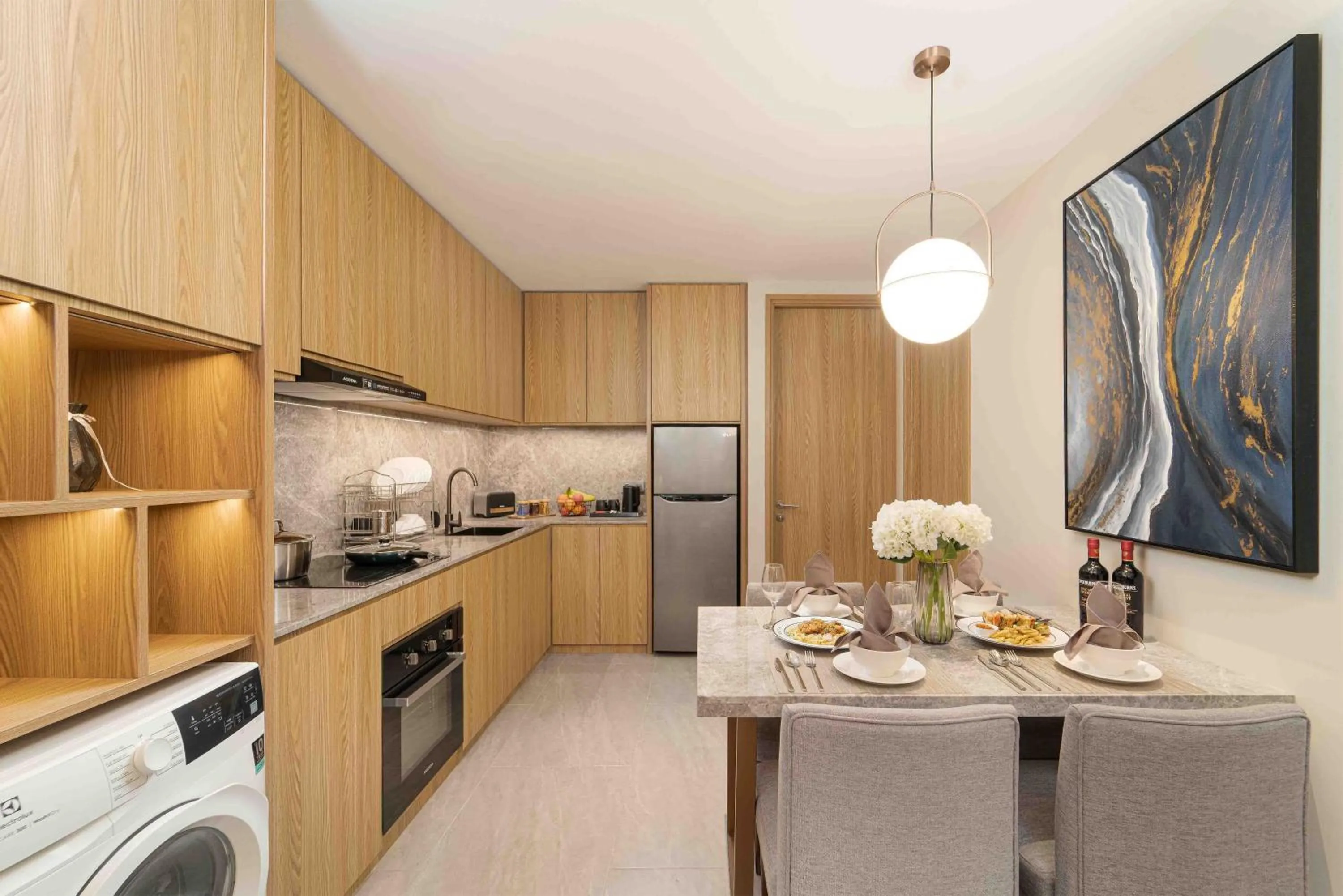 Kitchen or kitchenette in Oakwood Hotel & Apartments Grand Batam