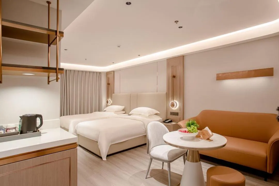 Bed in Poltton International Apartment - Foshan Gaoming Yingxin Plaza