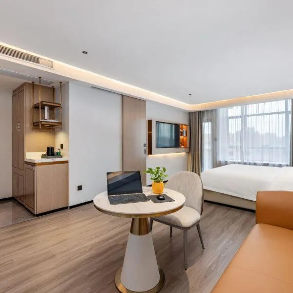 Bed in Poltton International Apartment - Foshan Gaoming Yingxin Plaza