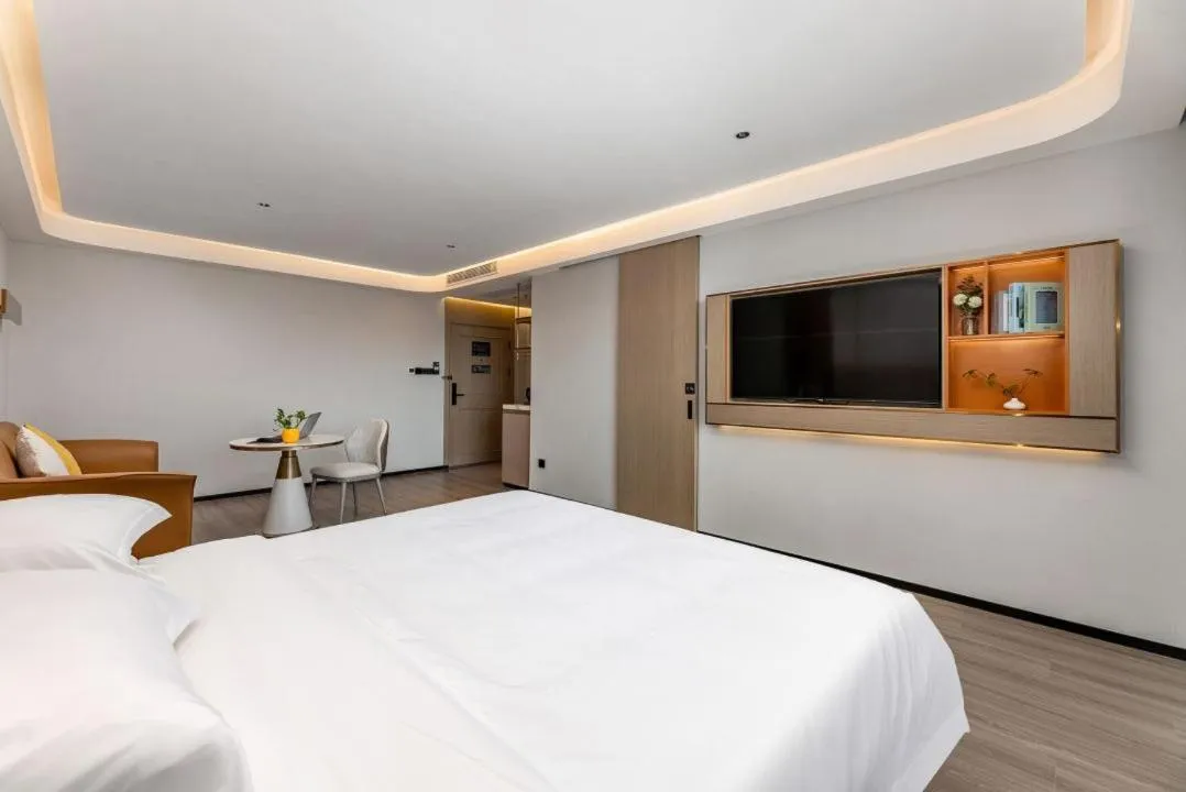 TV and multimedia in Poltton International Apartment - Foshan Gaoming Yingxin Plaza