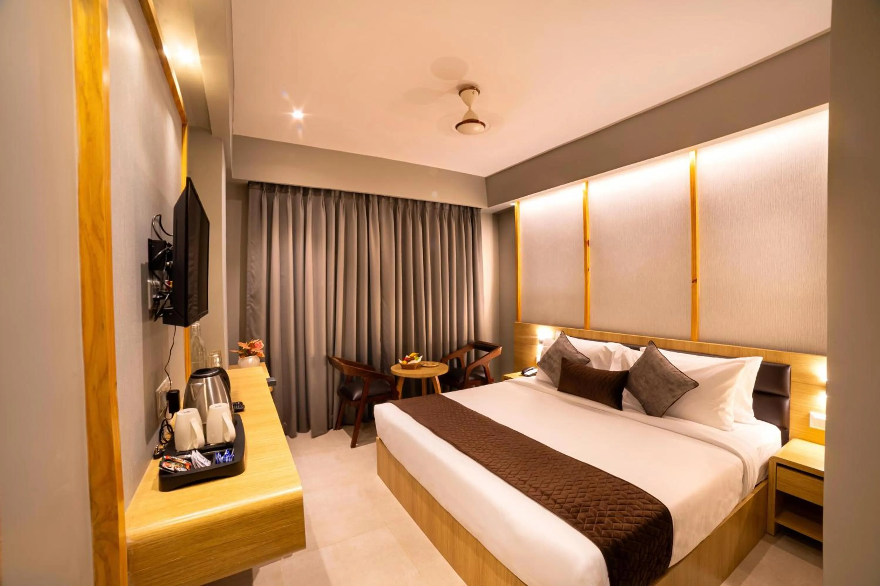 Photo of the whole room, Bed in NORTHIN Hotel Kolkata Airport