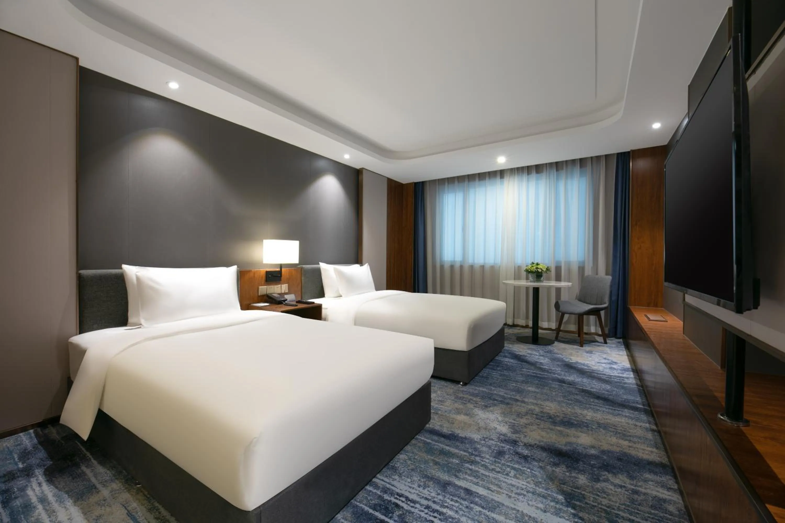 Bed in Furunde Wanda Jin Hotel