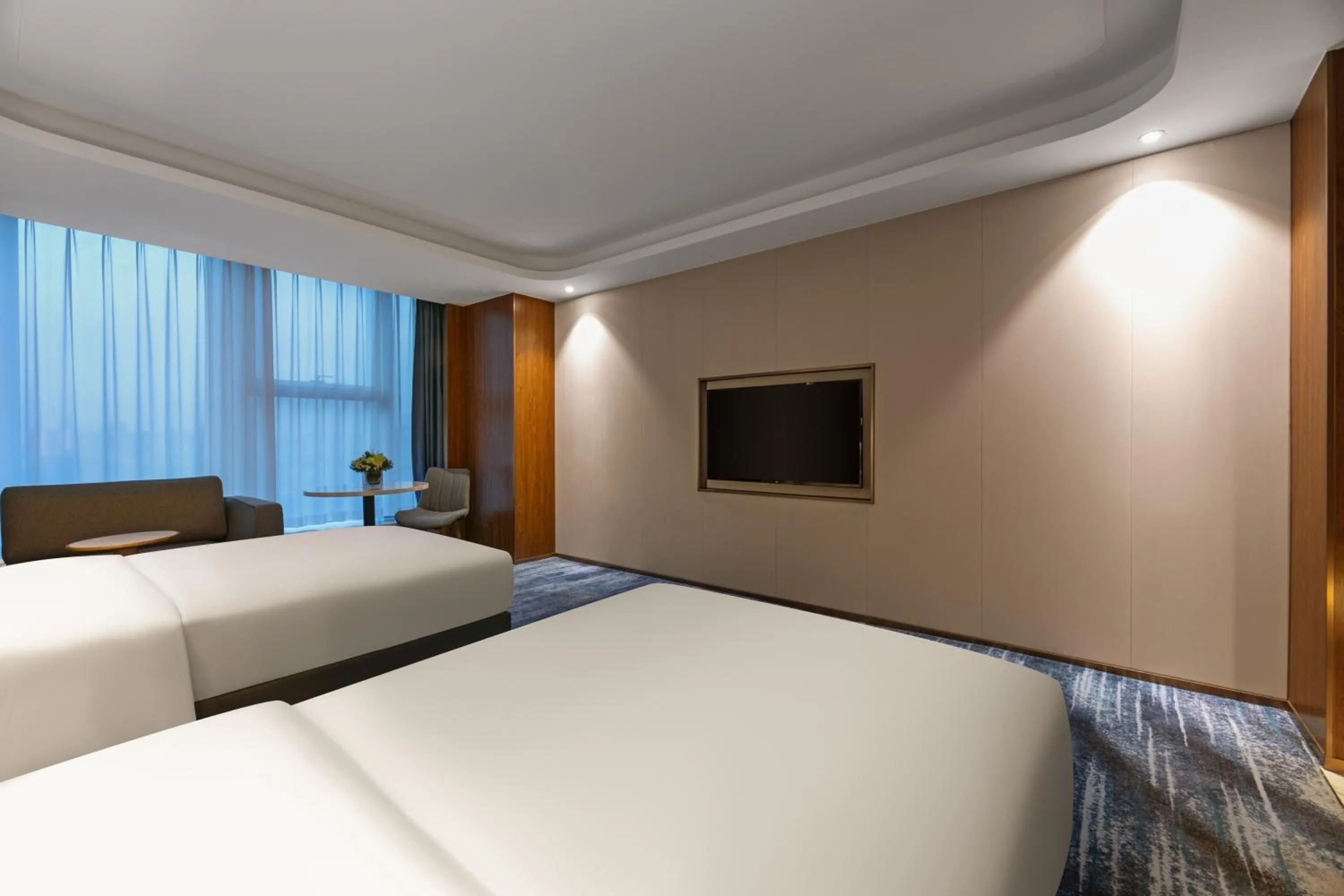 Bed in Furunde Wanda Jin Hotel