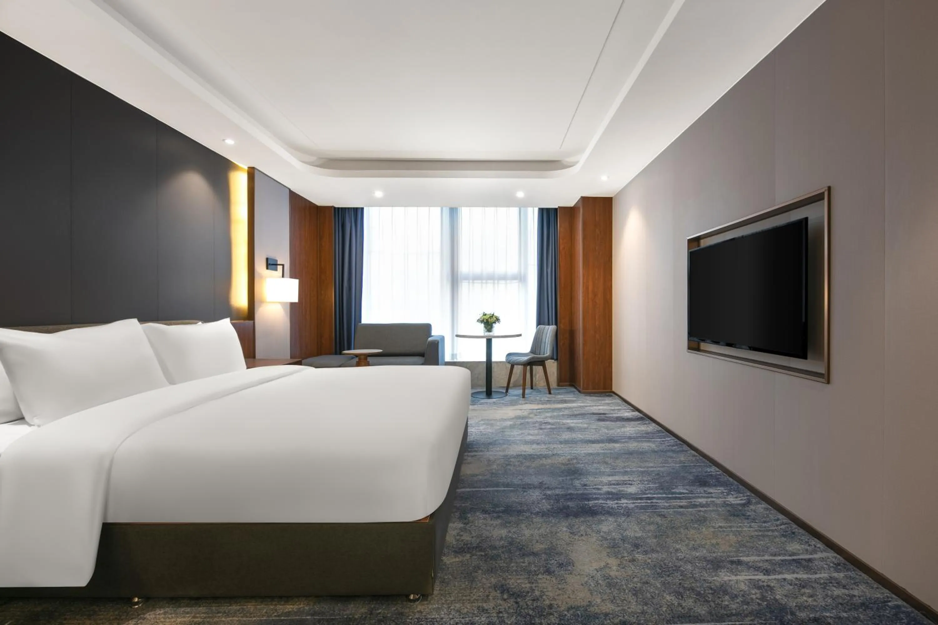 Bed in Furunde Wanda Jin Hotel