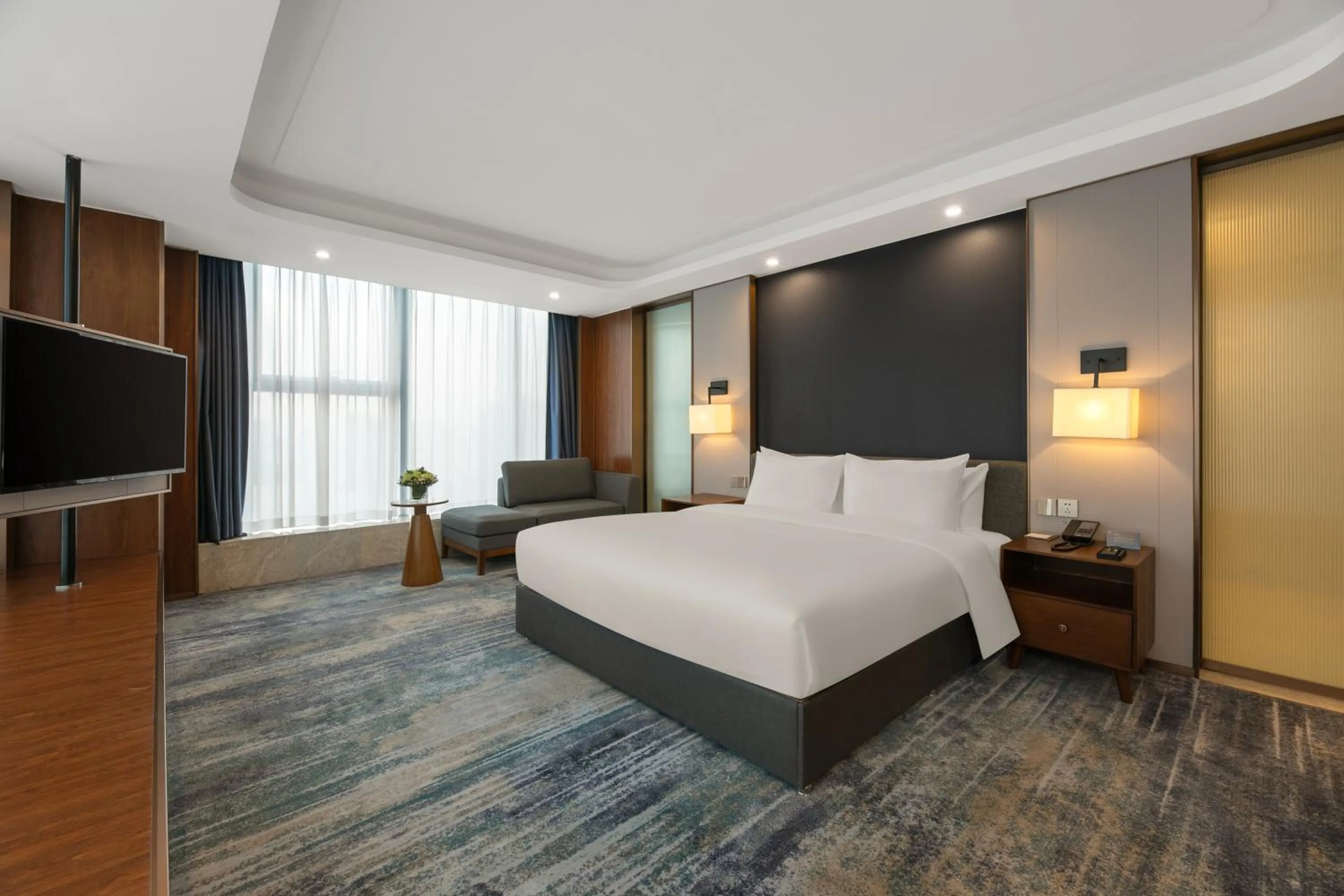 Bed in Furunde Wanda Jin Hotel