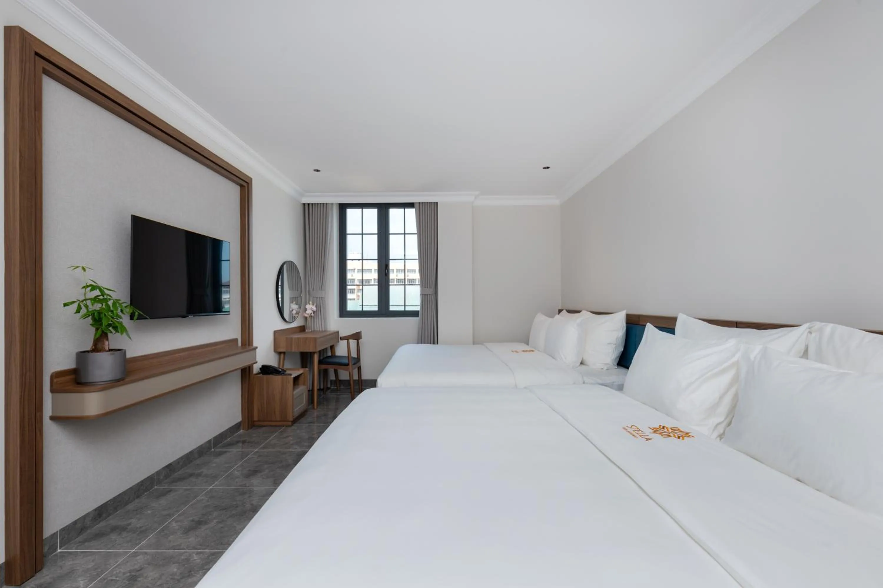 Bed in STELLA Hotel & Apartment