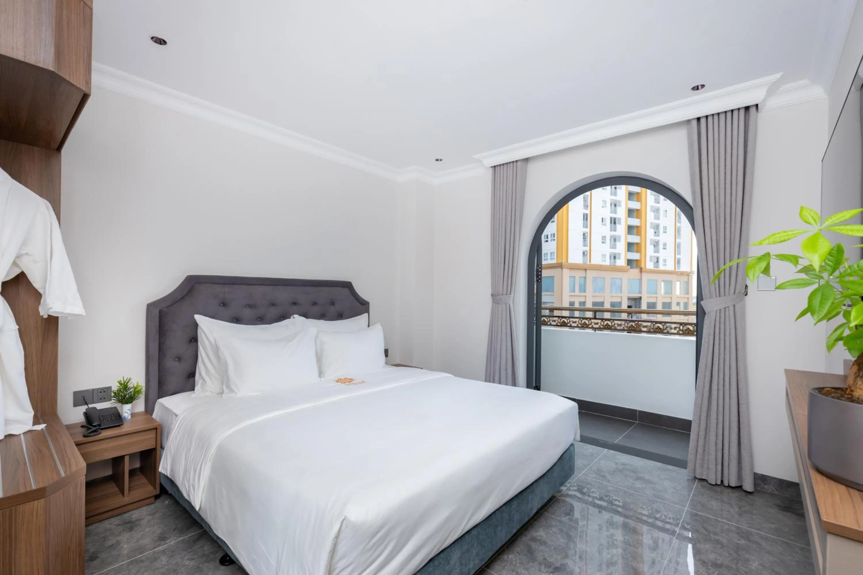 Bed in STELLA Hotel & Apartment