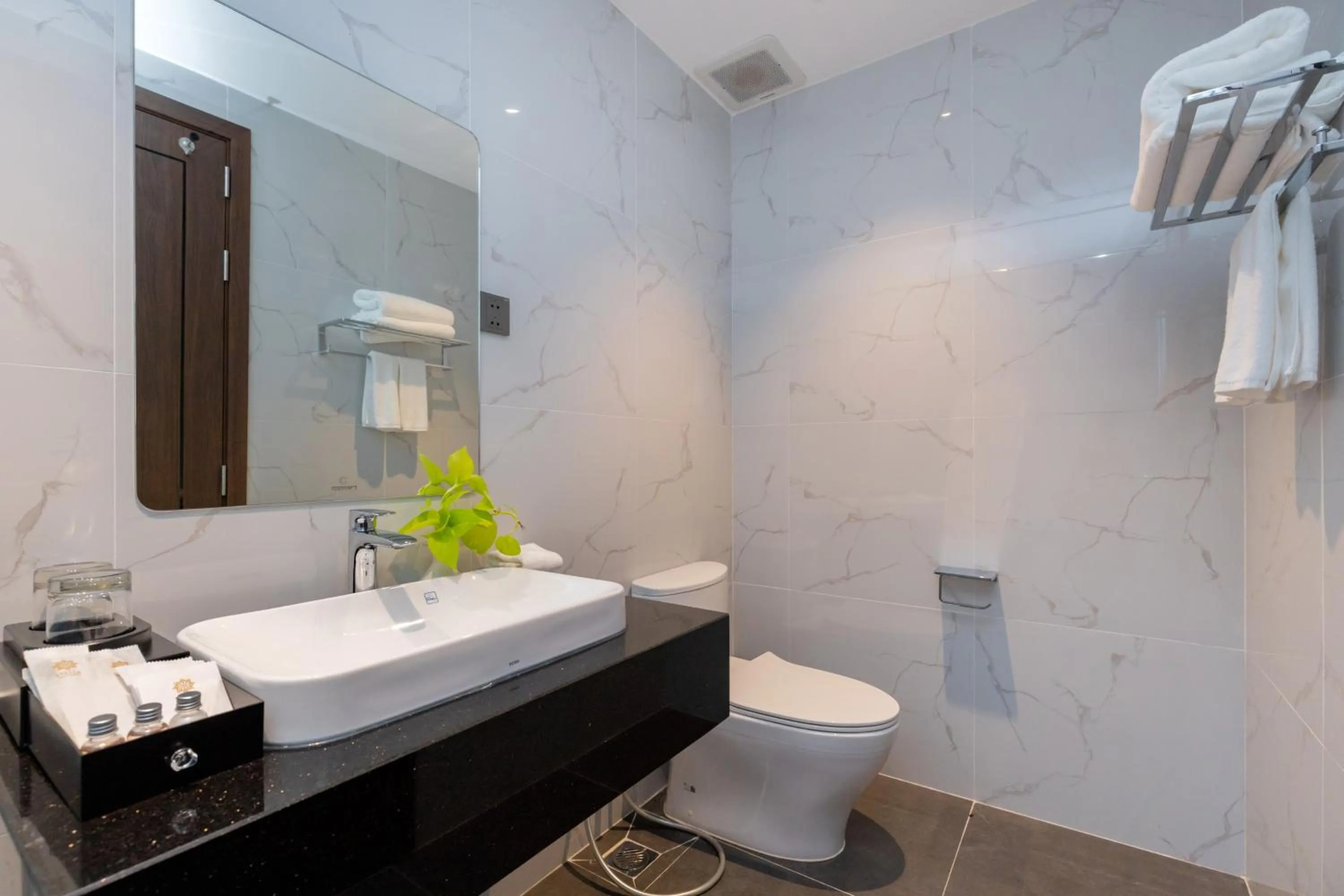 Bathroom in STELLA Hotel & Apartment