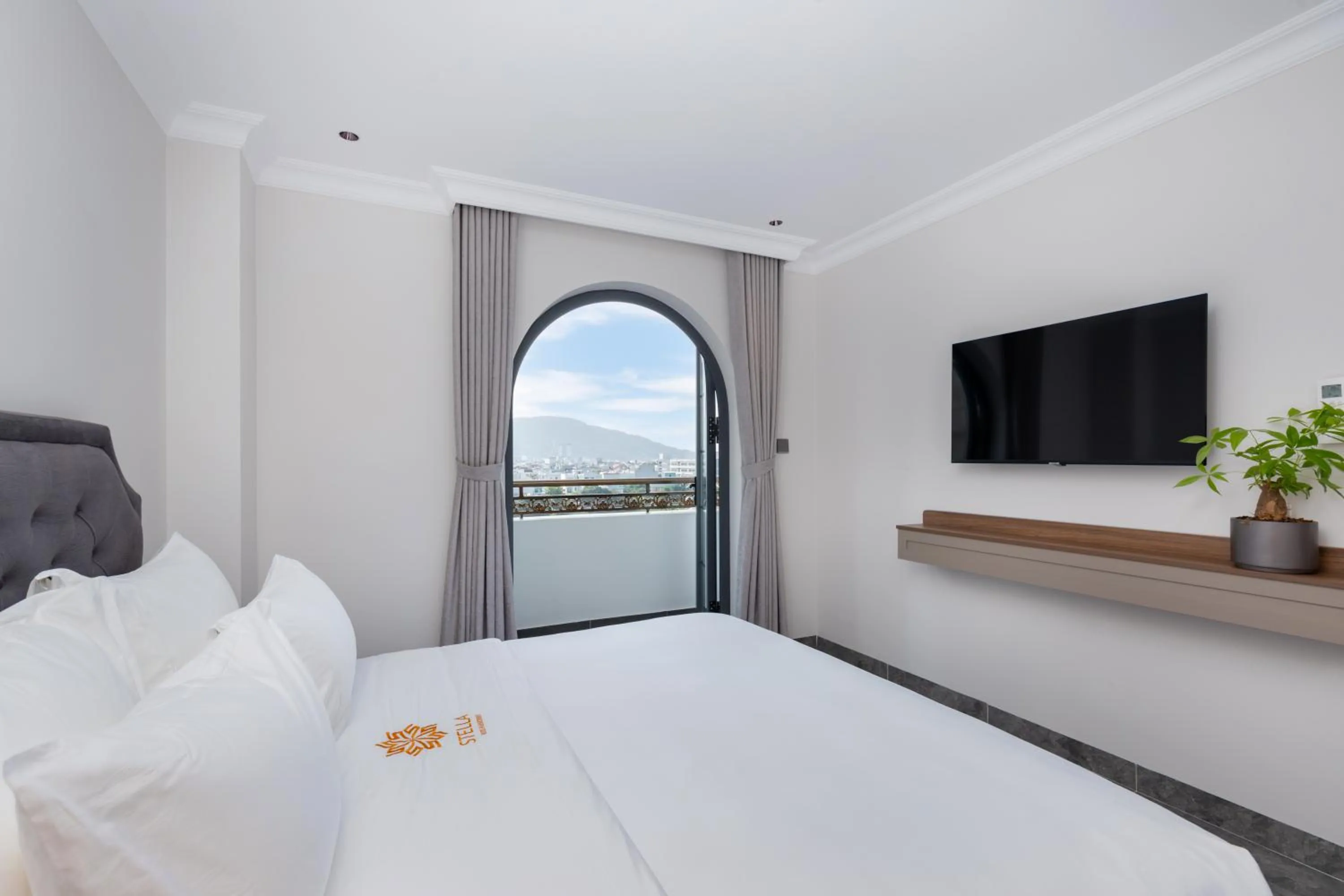 Bed in STELLA Hotel & Apartment