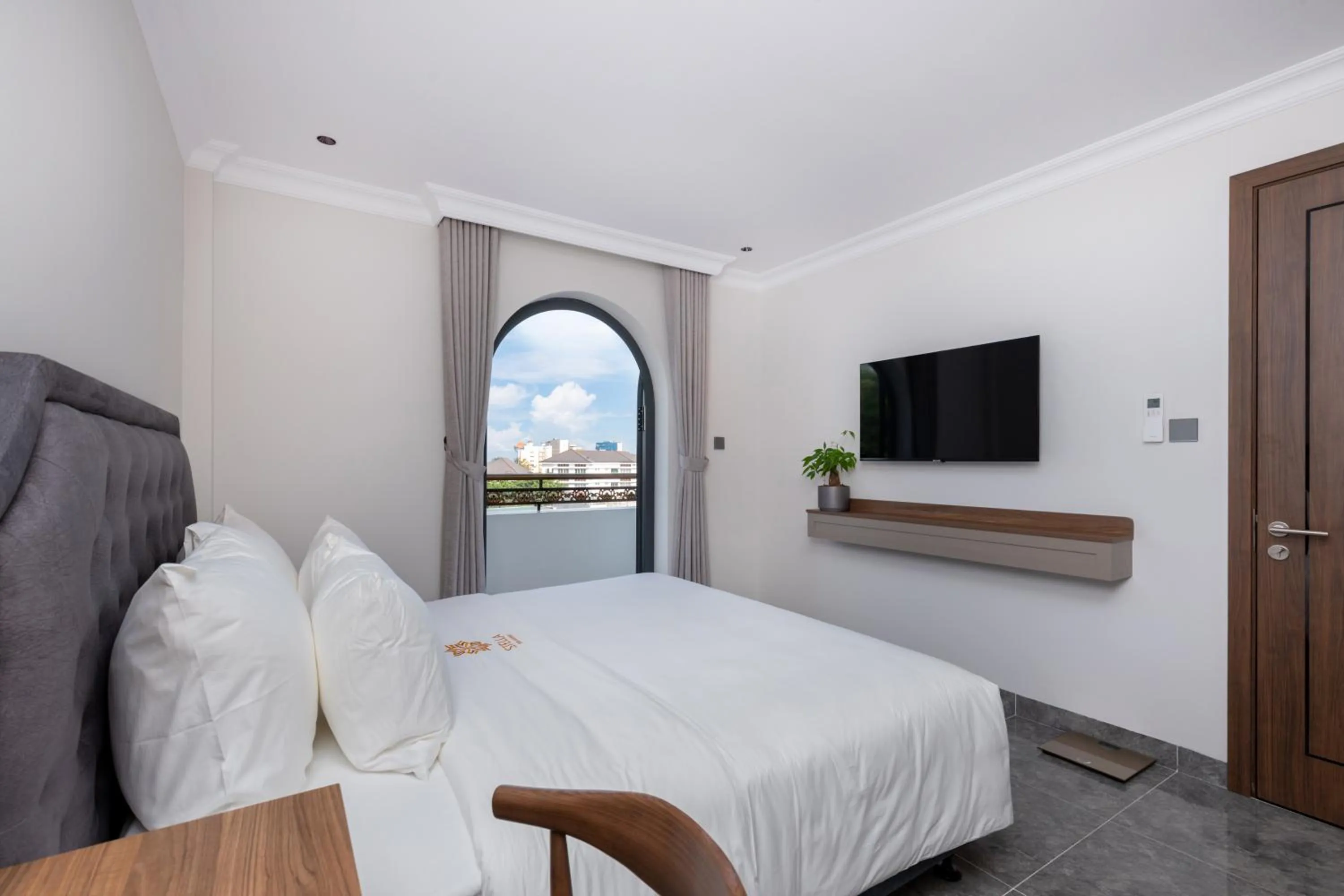 Bed in STELLA Hotel & Apartment