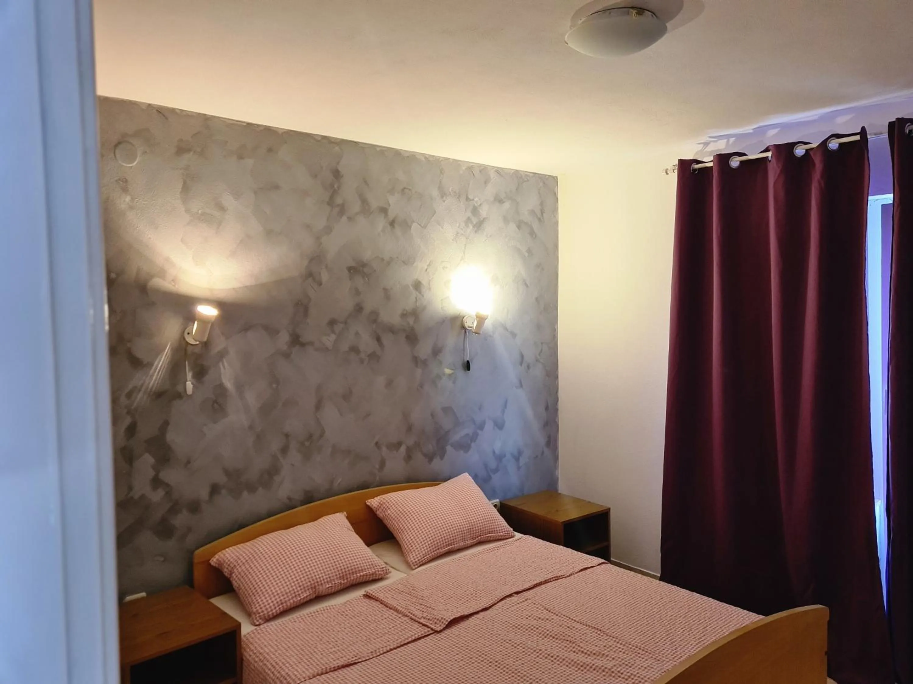 Bed in Apartments Niko