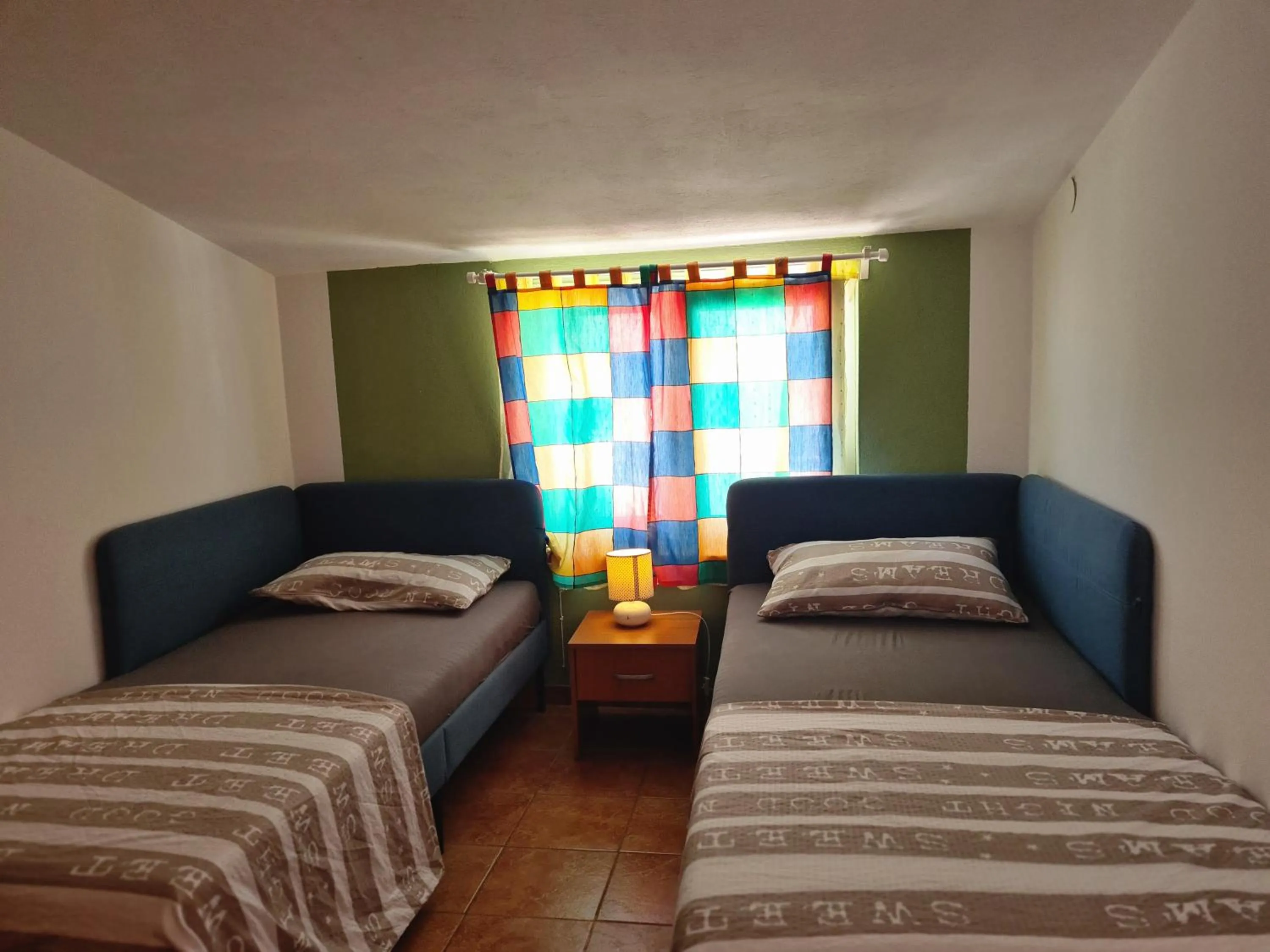 Bed in Apartments Niko