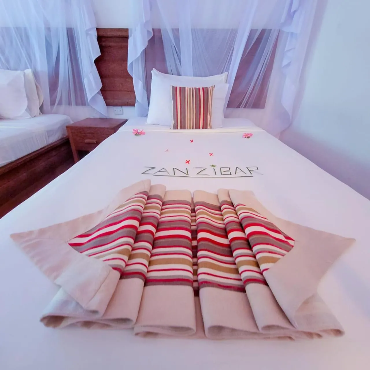 Bed in Zanzibar Bahari Villas