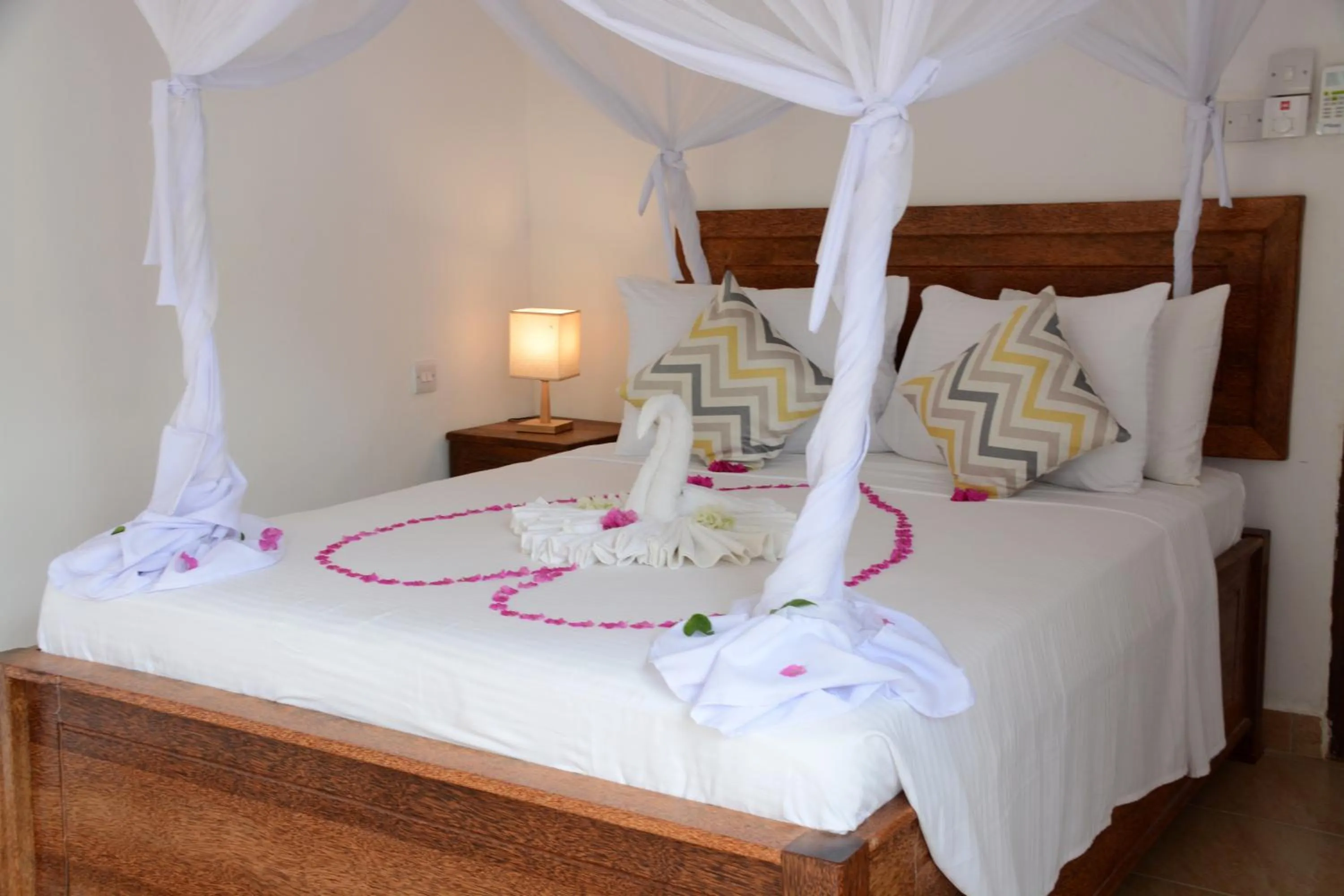 Bed in Zanzibar Bahari Villas