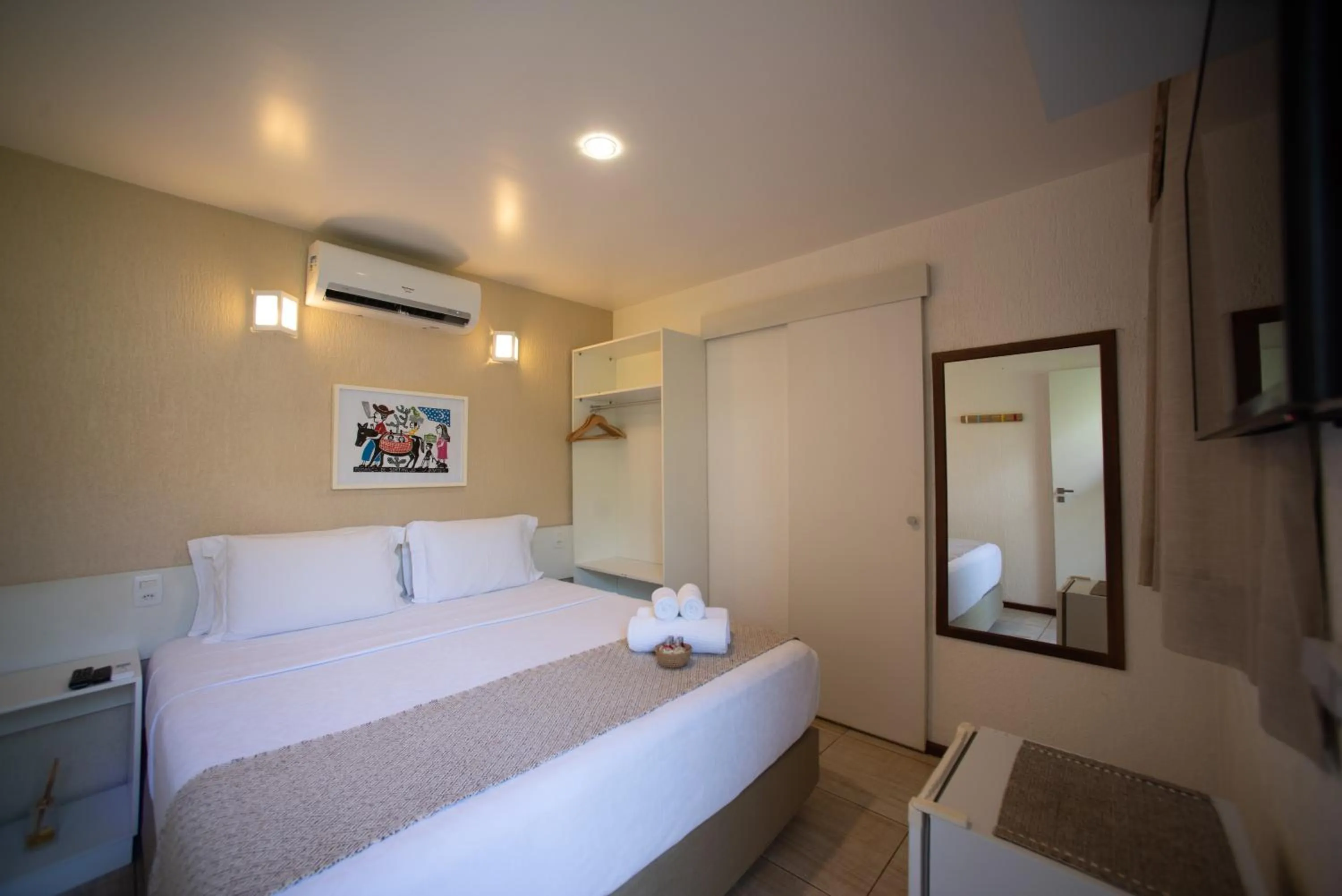 Bed in Pousada Malibu