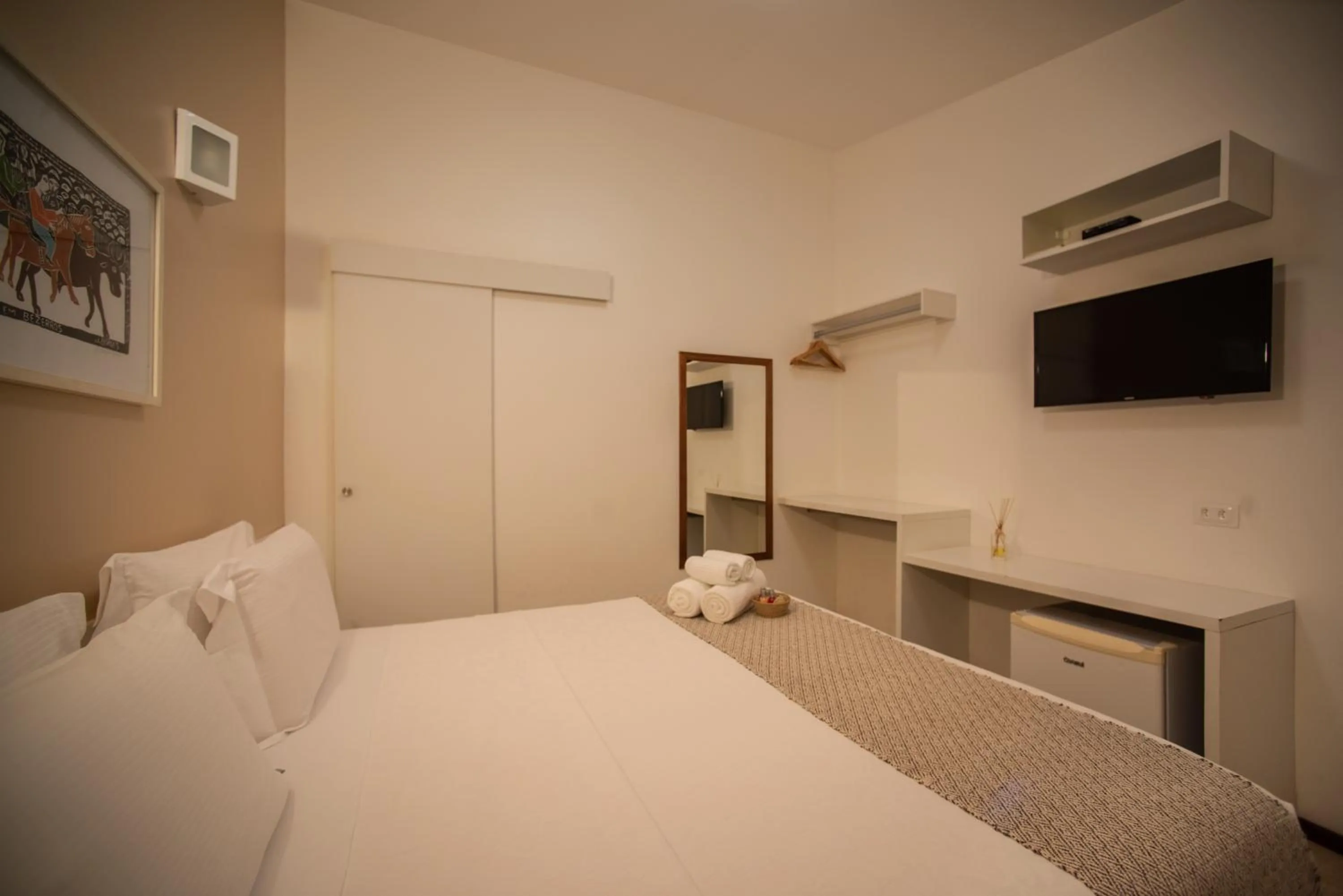 Bed in Pousada Malibu