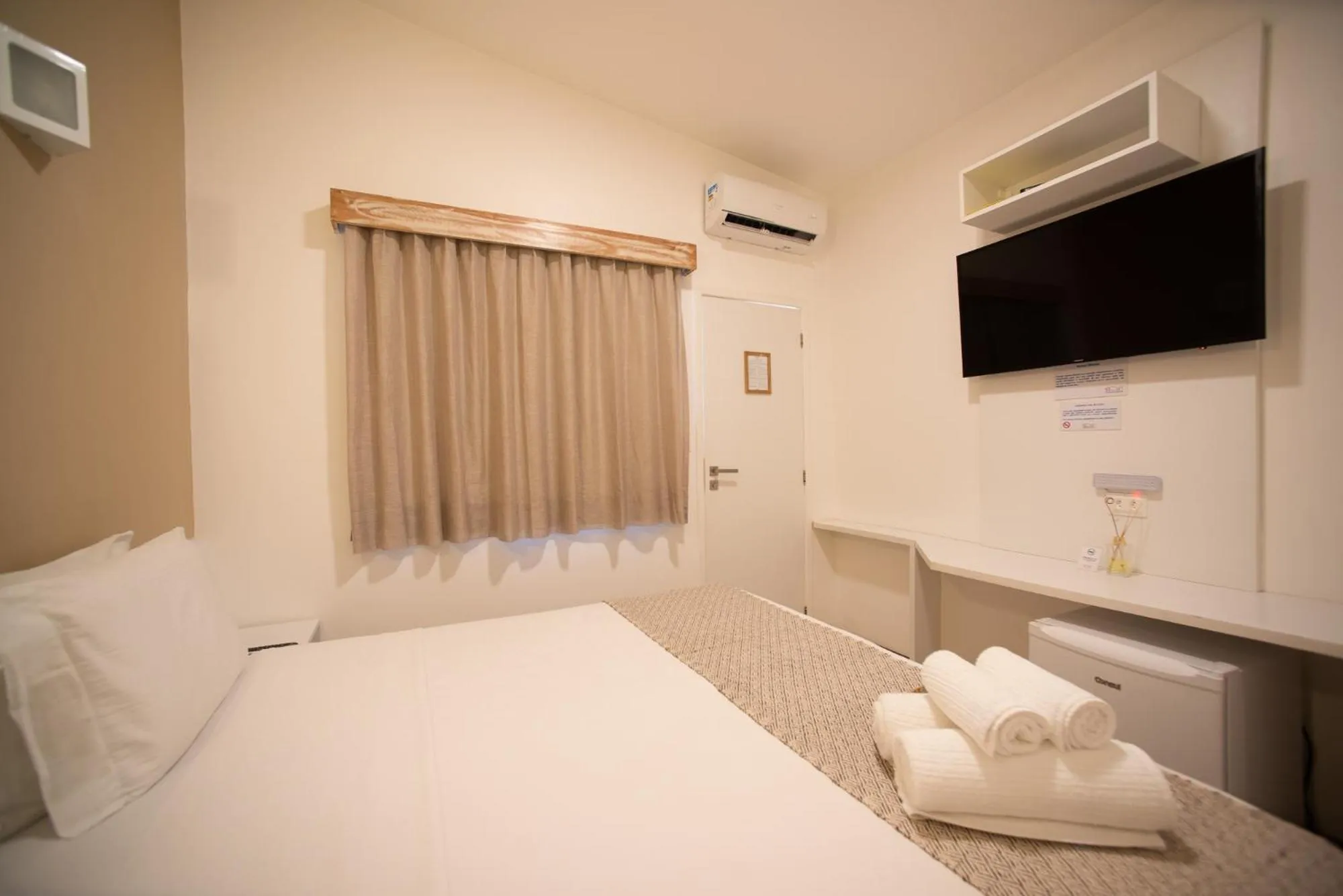 Bed in Pousada Malibu