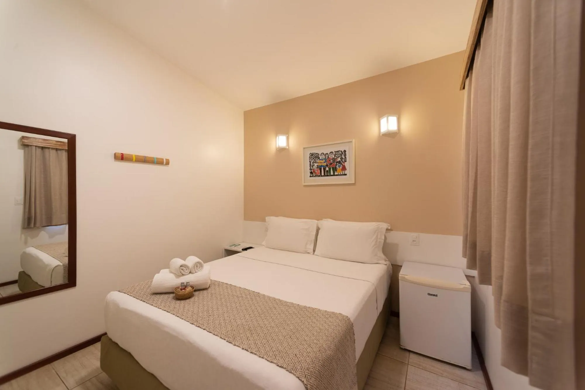 Bed in Pousada Malibu