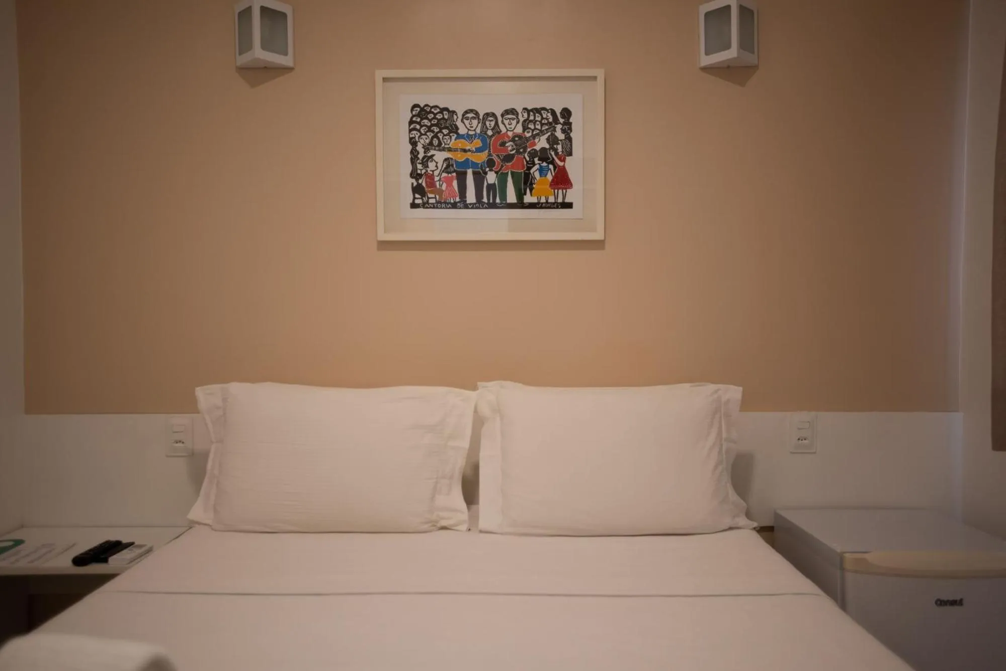 Bed in Pousada Malibu