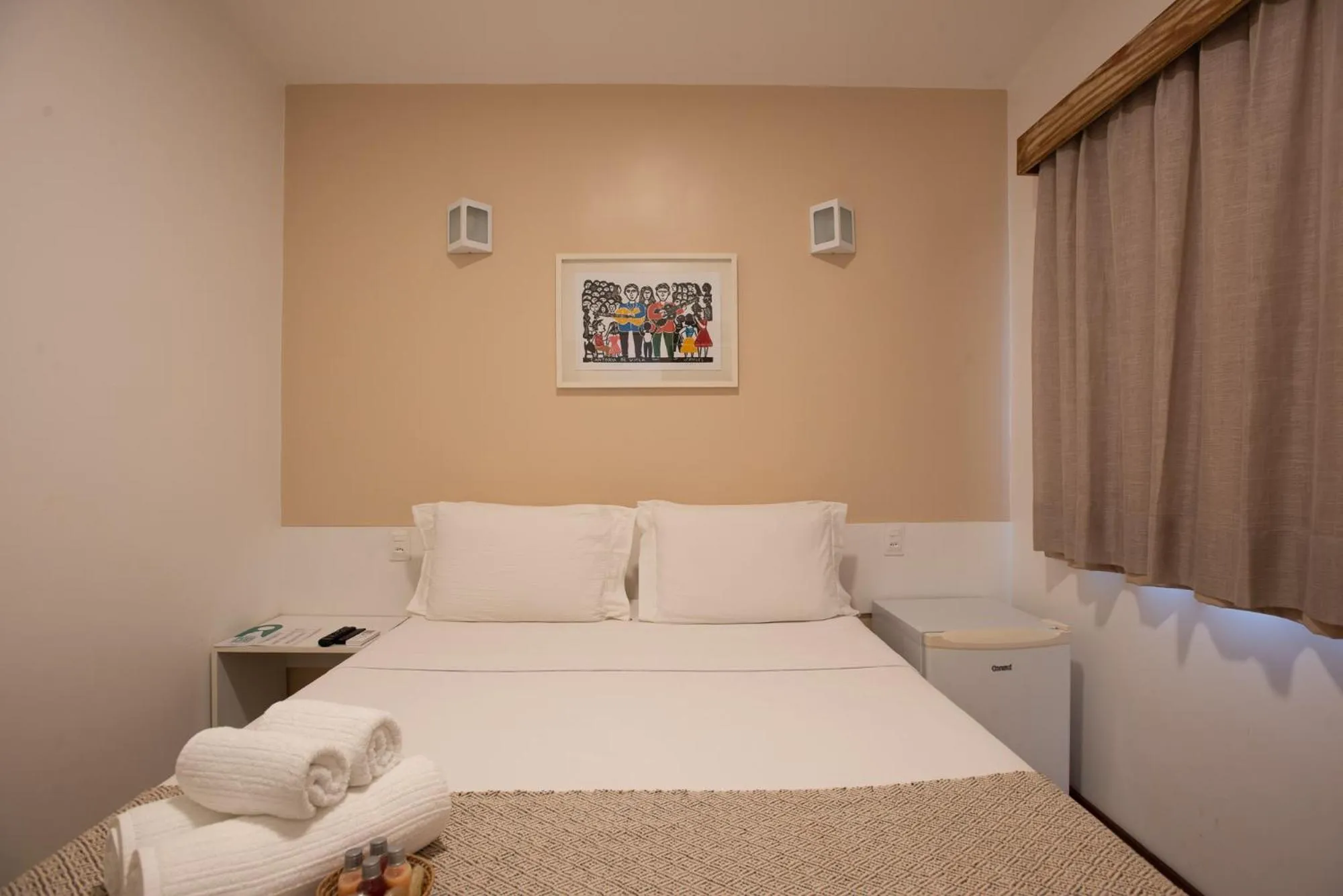 Bed in Pousada Malibu