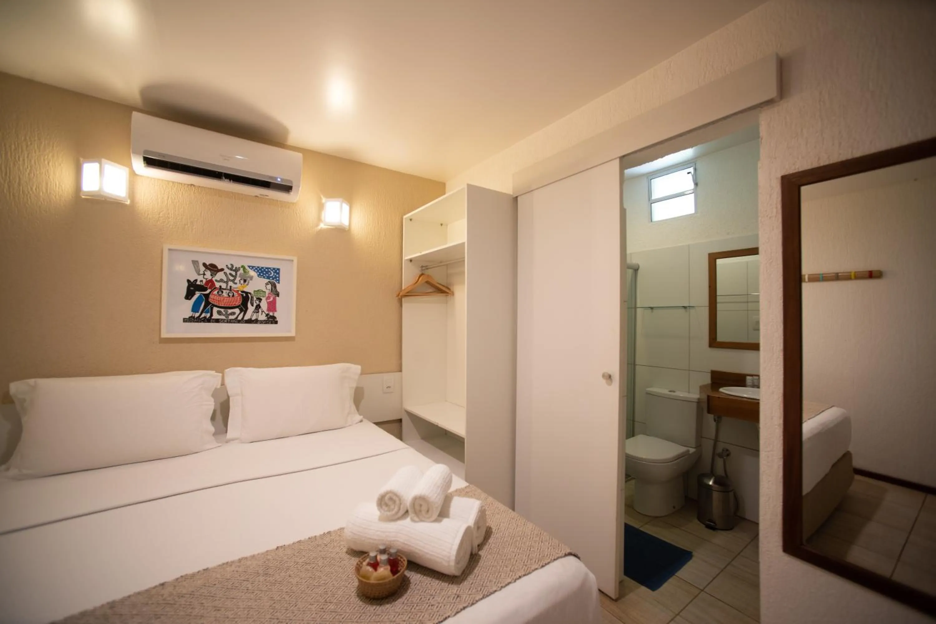 Bed in Pousada Malibu