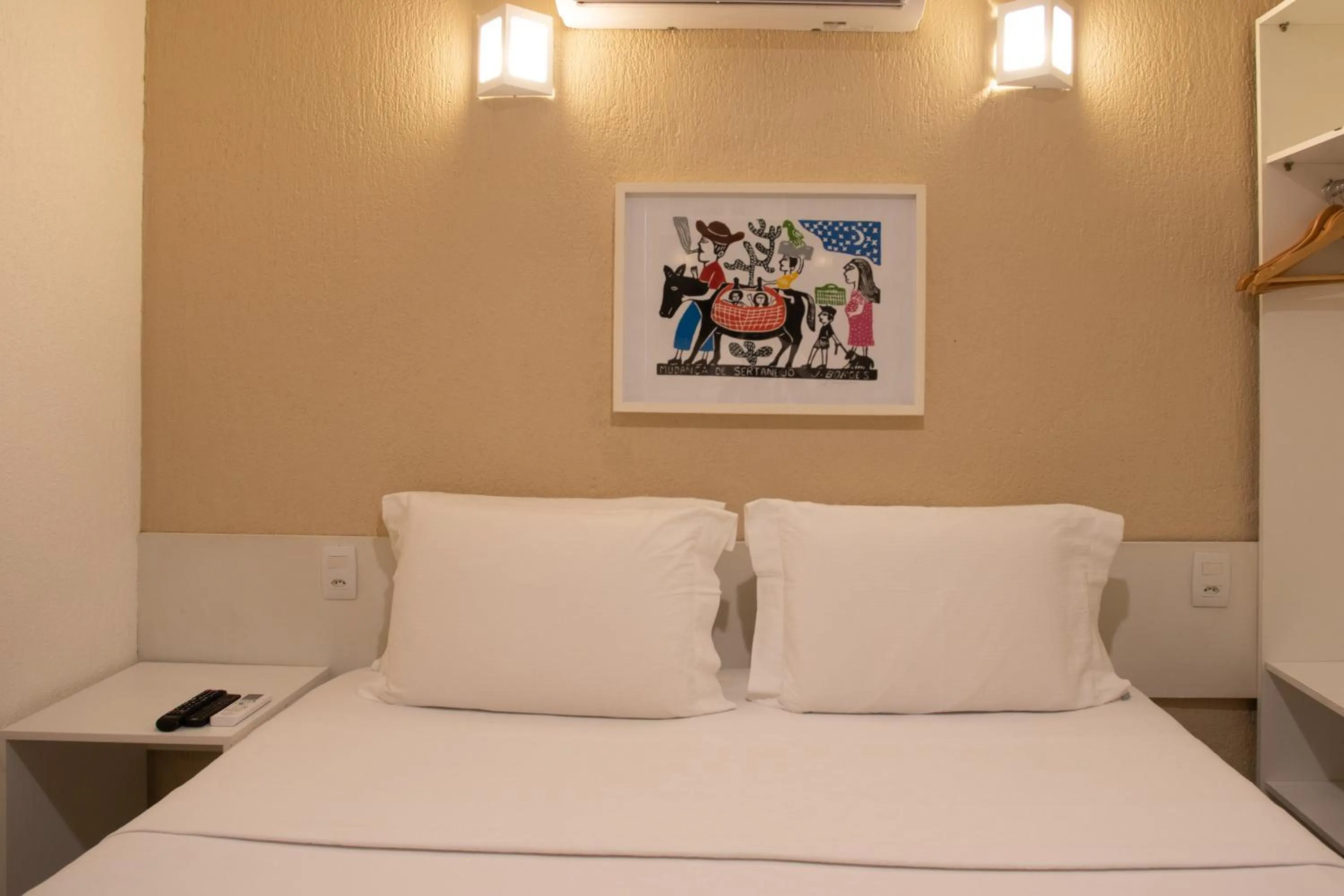 Bed in Pousada Malibu