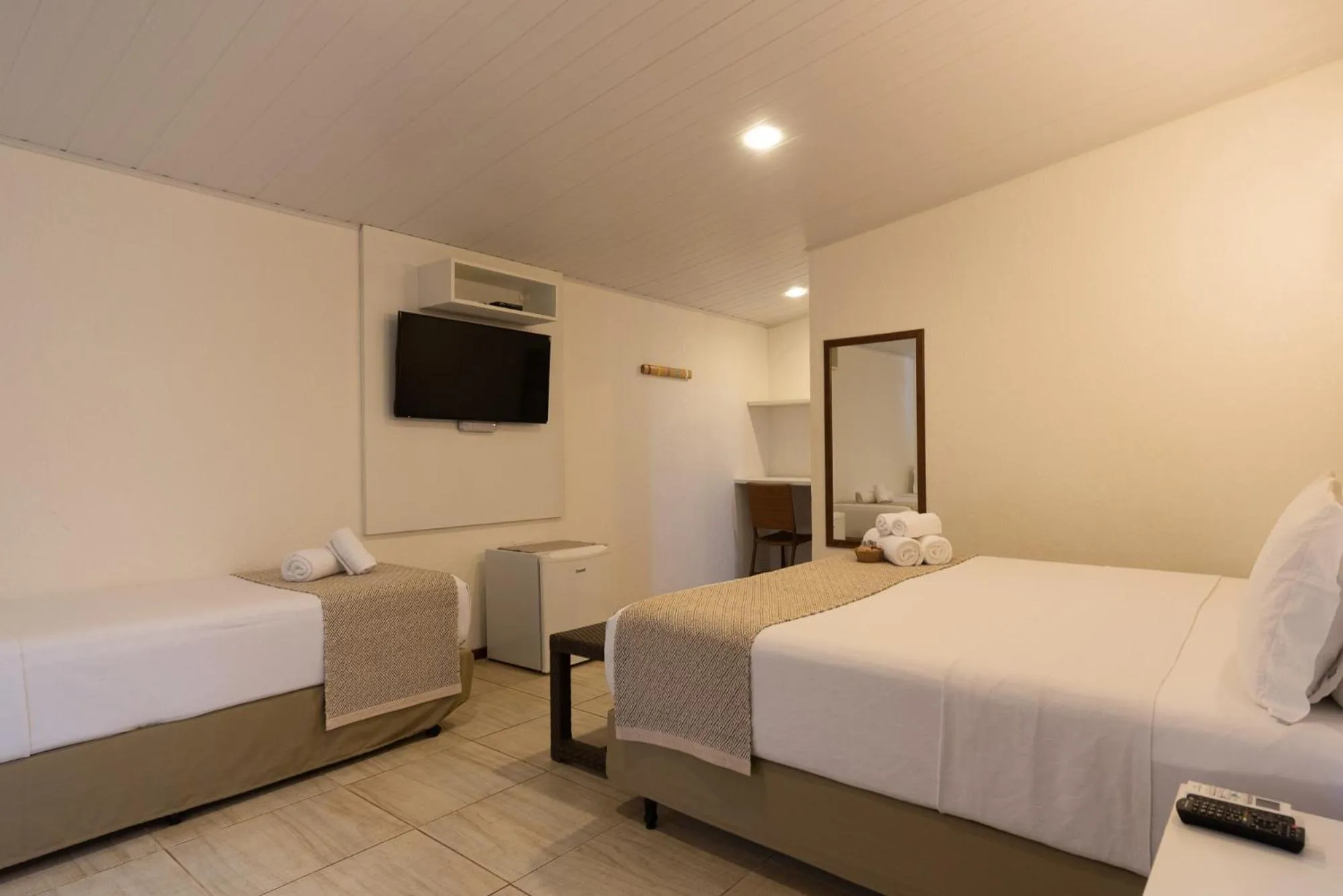 Bed in Pousada Malibu