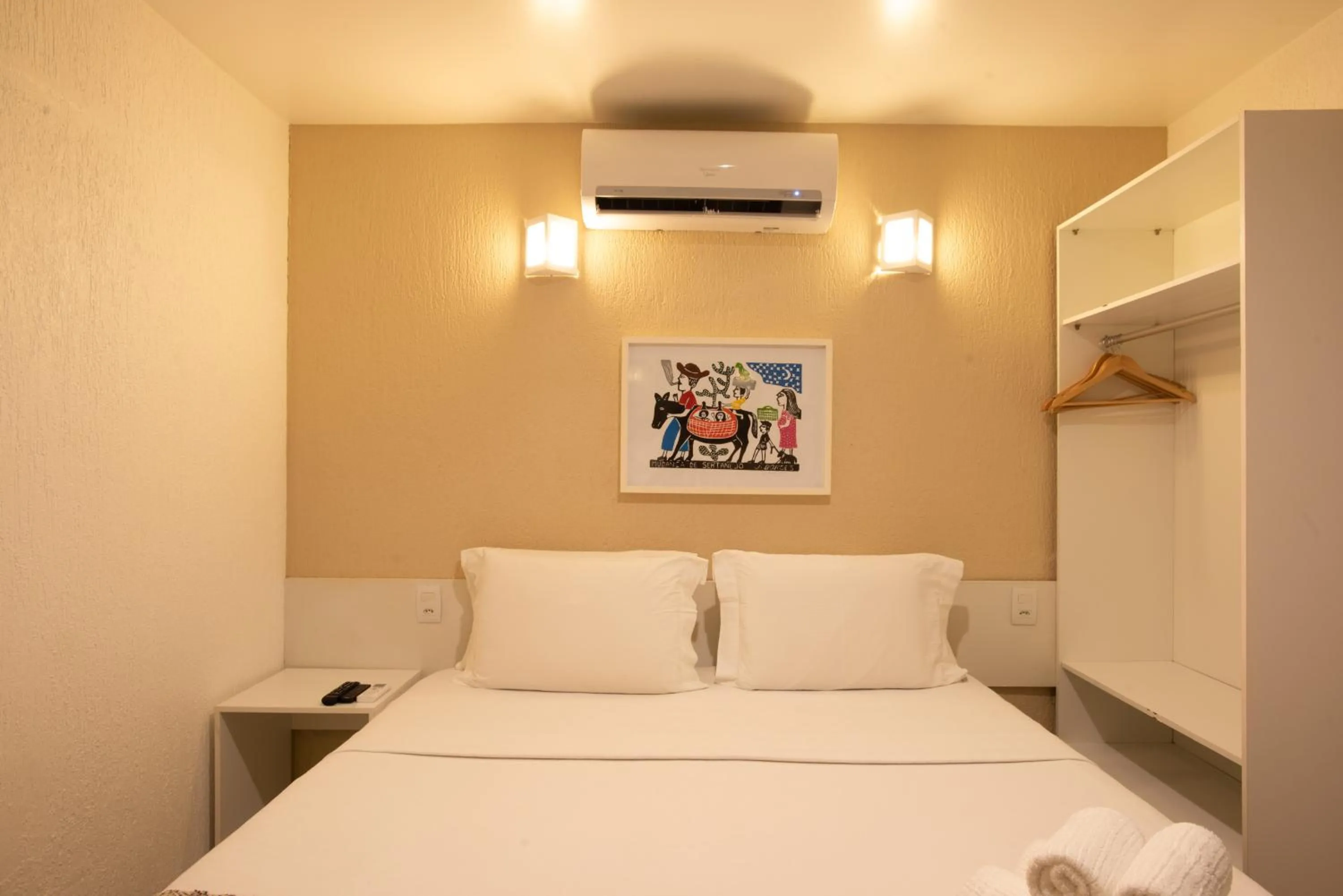 Bed in Pousada Malibu