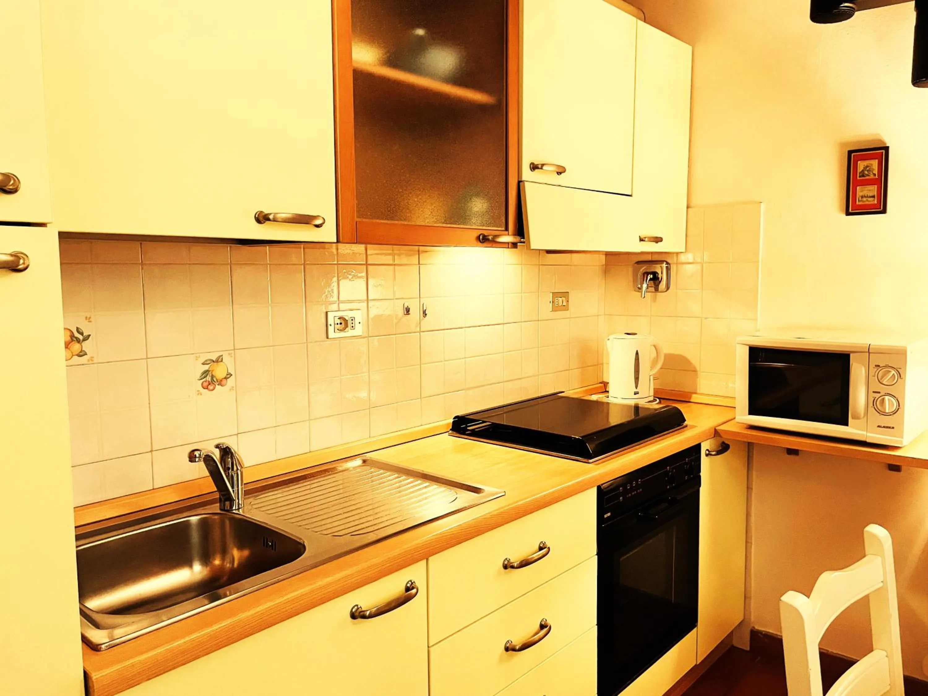 Kitchen or kitchenette in Residence La Contessina